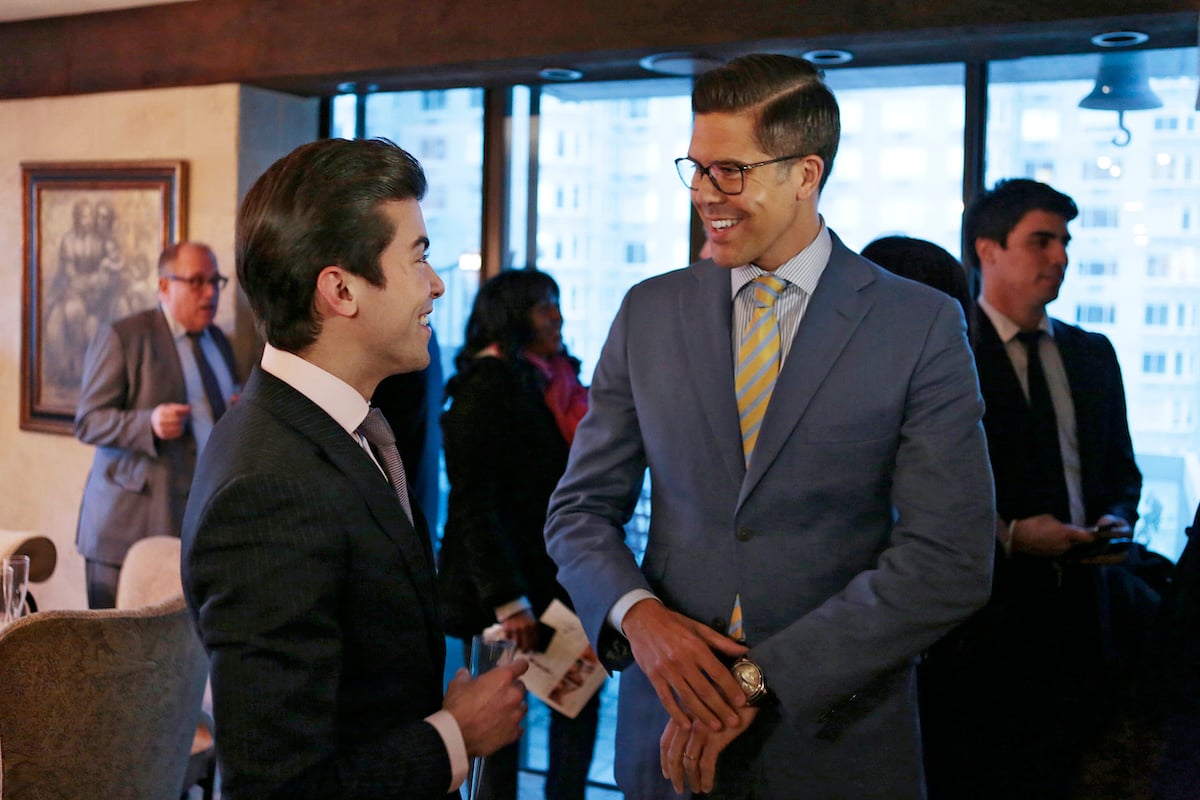 Luis D. Ortiz chats with Fredrik Eklund  at a brokers open