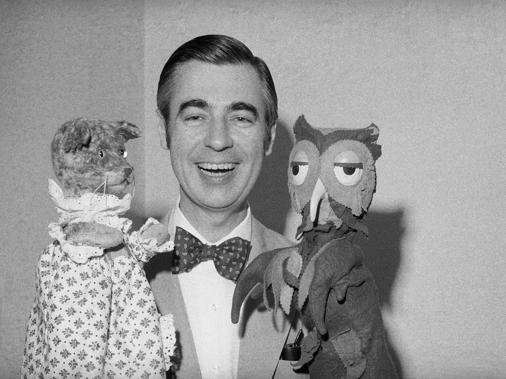 Mr. Rogers with two puppets
