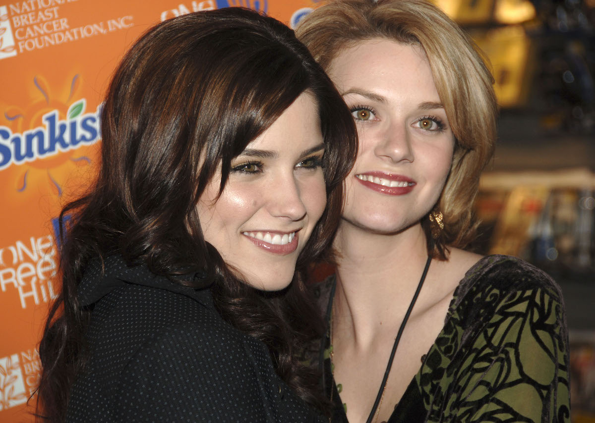 Sophia Bush and Hilarie Burton of 'One Tree Hill' pose together with their heads close together
