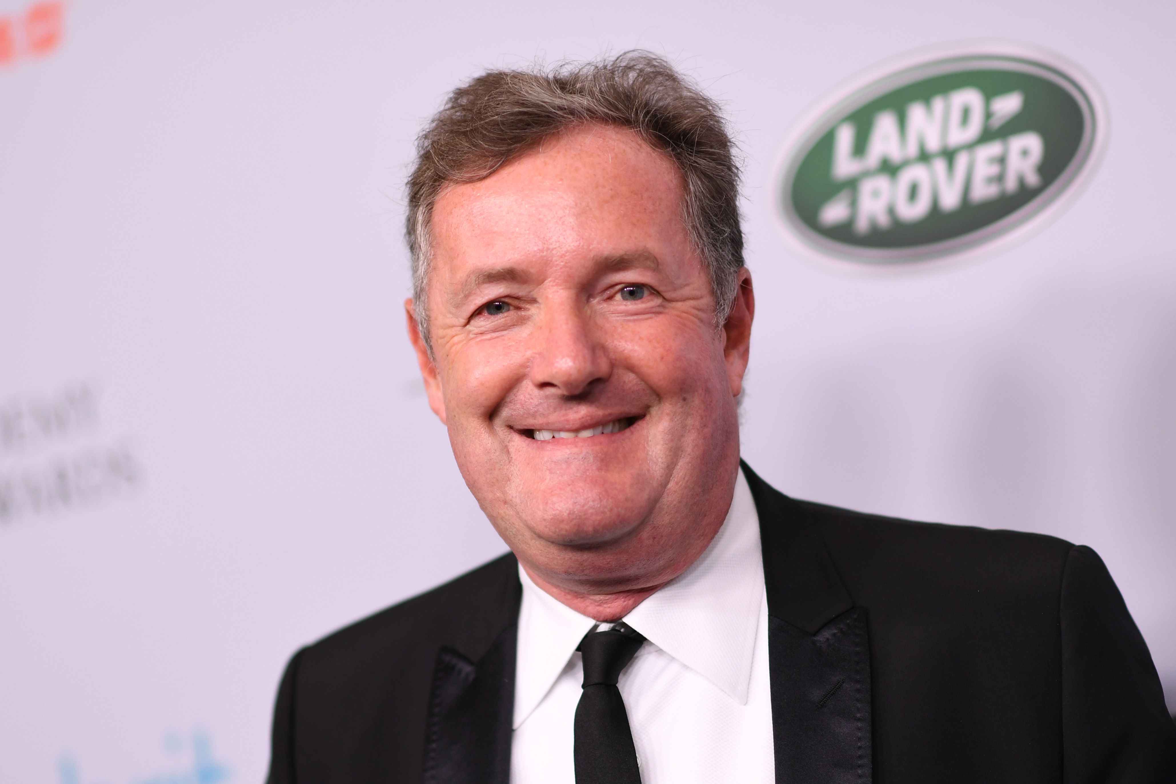British journalist Piers Morgan arrives for the 2019 British Academy Britannia (BAFTA) awards at the Beverly Hilton hotel in Beverly Hills wearing a black suit and tie