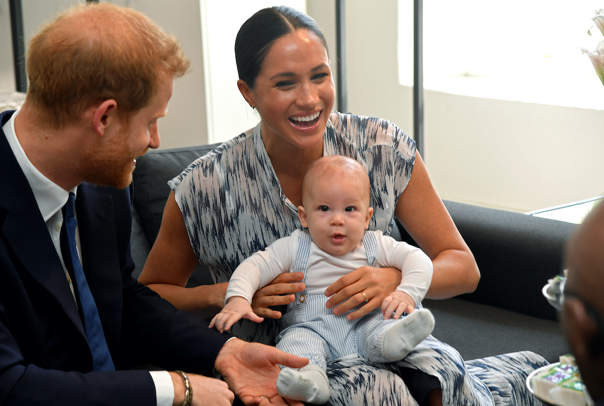Prince Harry and Meghan Markle with their son, Archie, in South Africa in 2019 