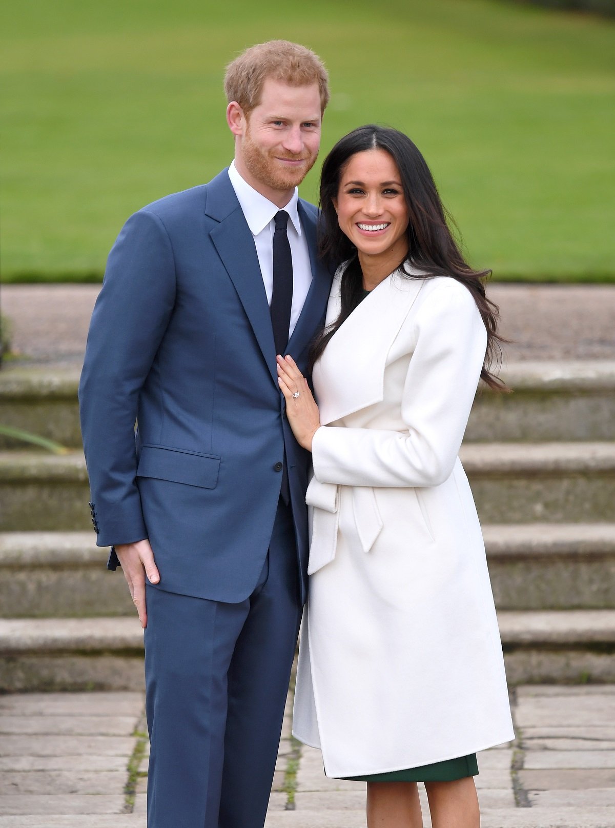 Prince Harry and Meghan Markle attend an official photocall to announce their engagement at The Sunken Gardens at Kensington Palace on November 27, 2017 in London, England. 