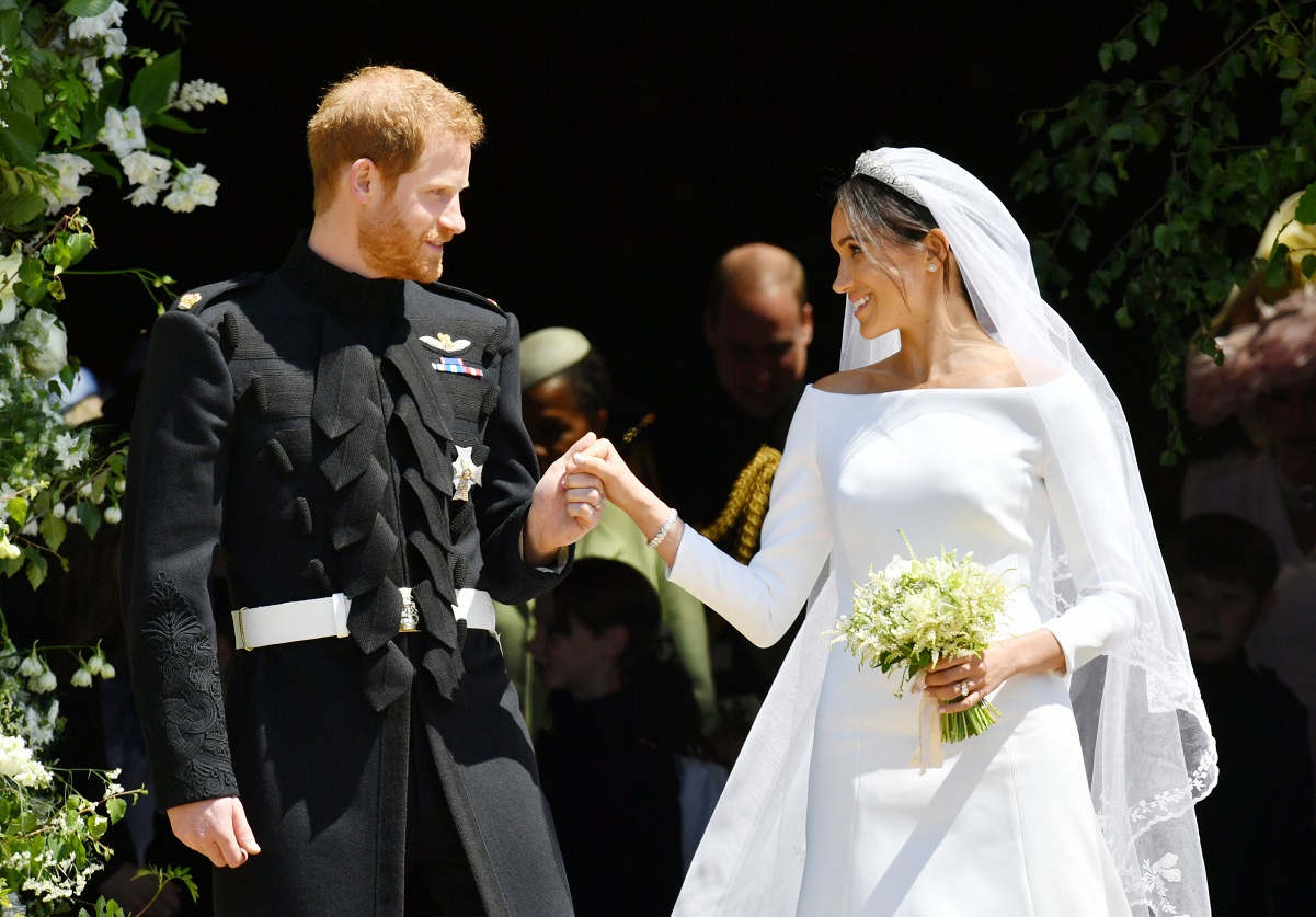 Prince Harry and Meghan Markle  emerge from the West Door of St. George's Chapel, after tying the knot