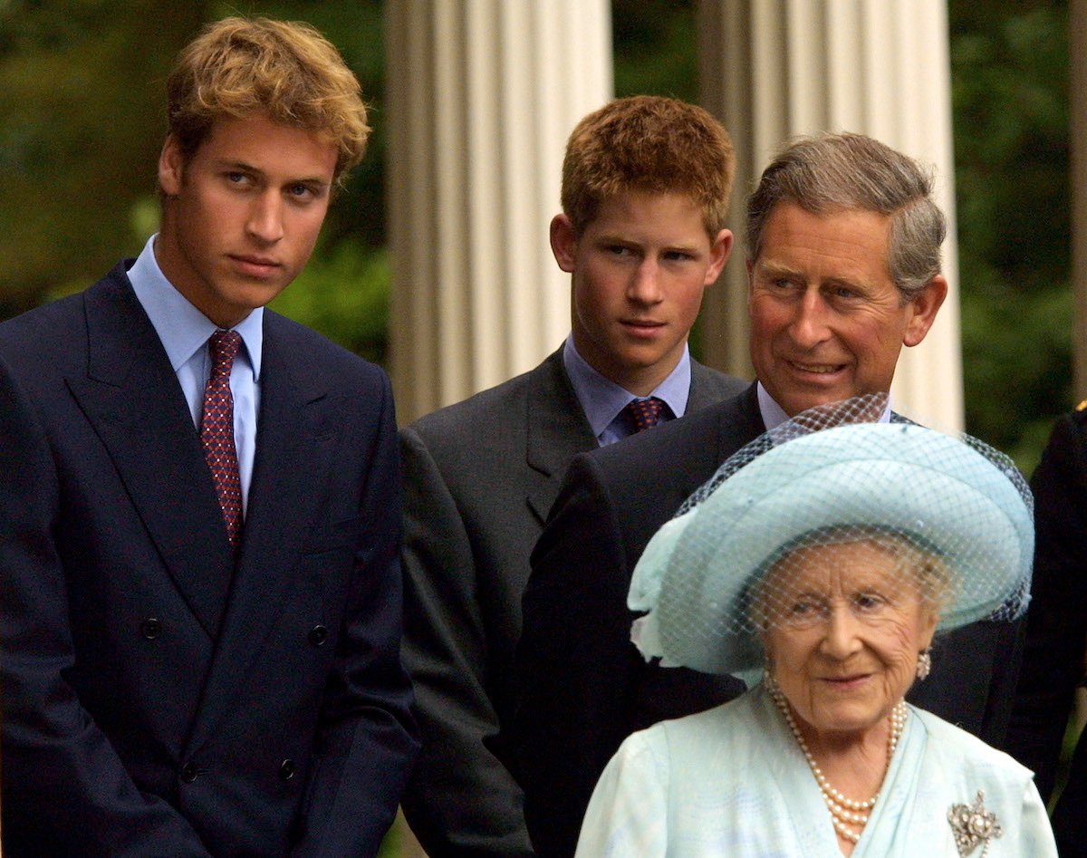 Prince William, Prince Harry, and Prince Charles stand behind the Queen Mother at Prince William's 21st birthday event