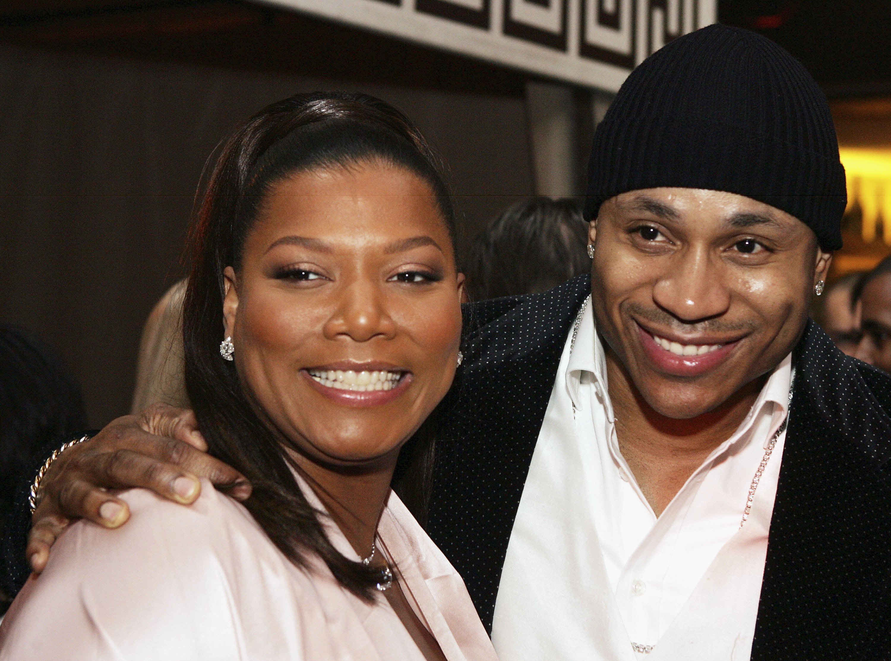 'The Equalizer' star Queen Latifah (L) and 'NCIS: Los Angeles' star LL Cool J pose at the afterparty for the premiere of Paramounts' "Last Holiday" at the Cabana Room on January 12, 2006
