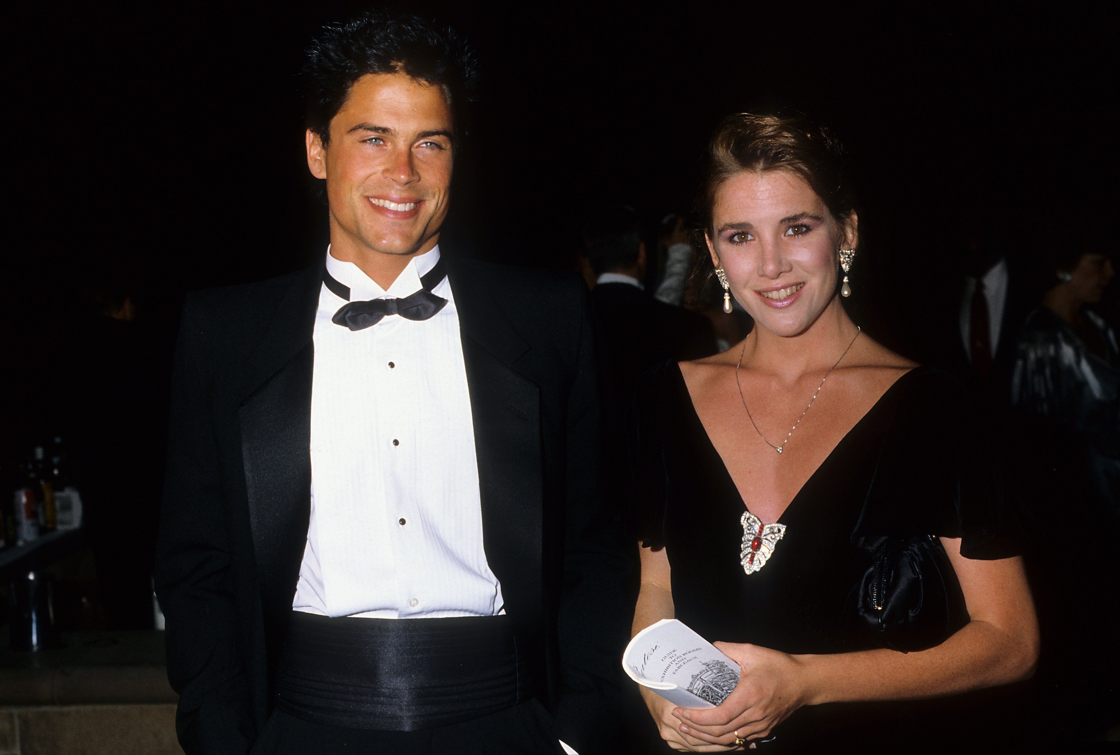 Rob Lowe and Melissa Gilbert pose together at event 1987