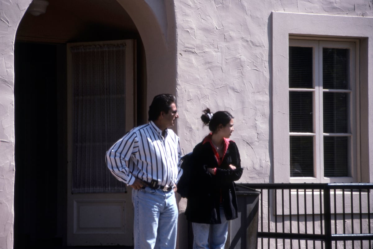 Robert Kardashian Sr. and Kim Kardashian West outside her high school in 1996.