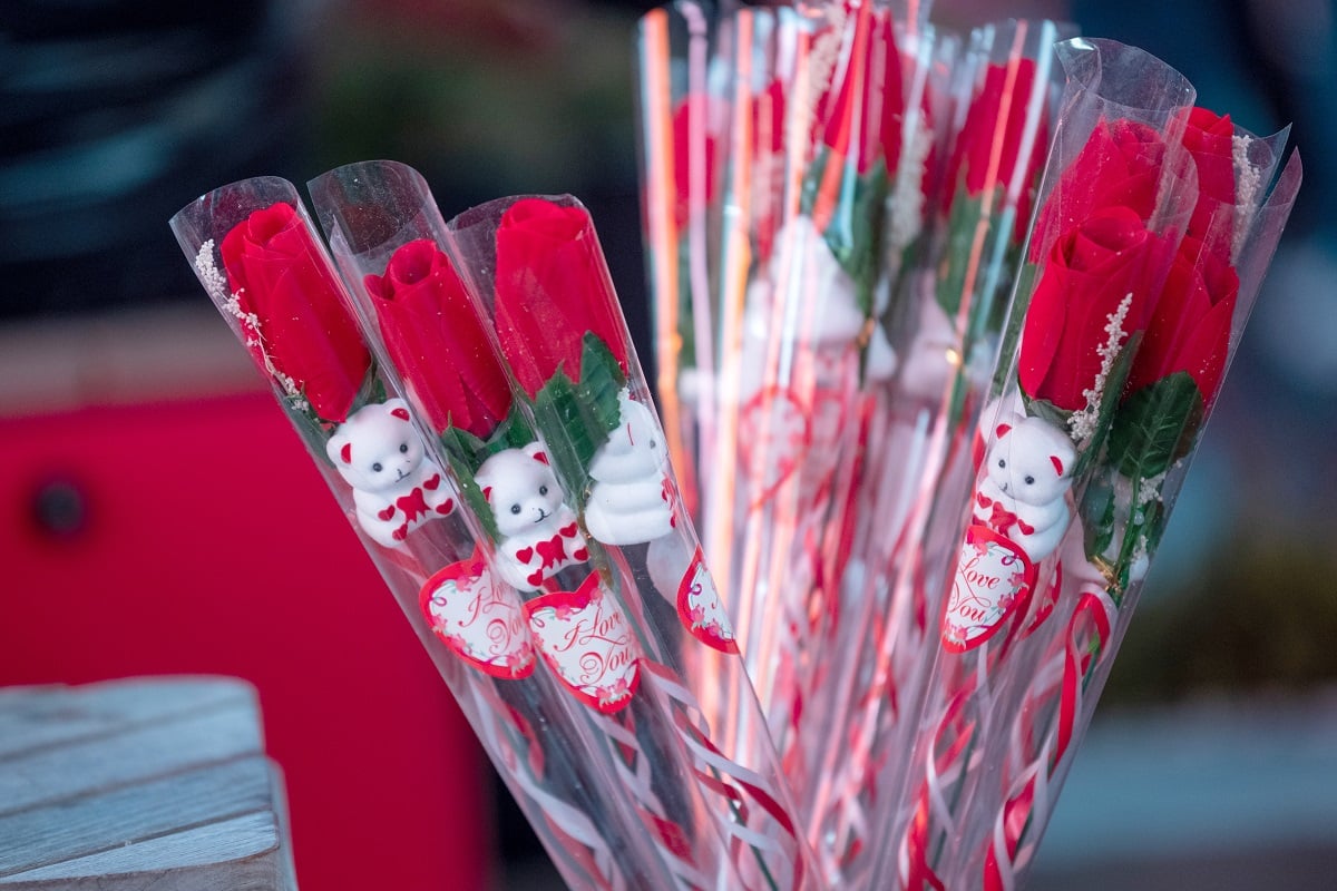 Individual roses in plastic are sold in in Times Square on February 14, 2021 in New York City.