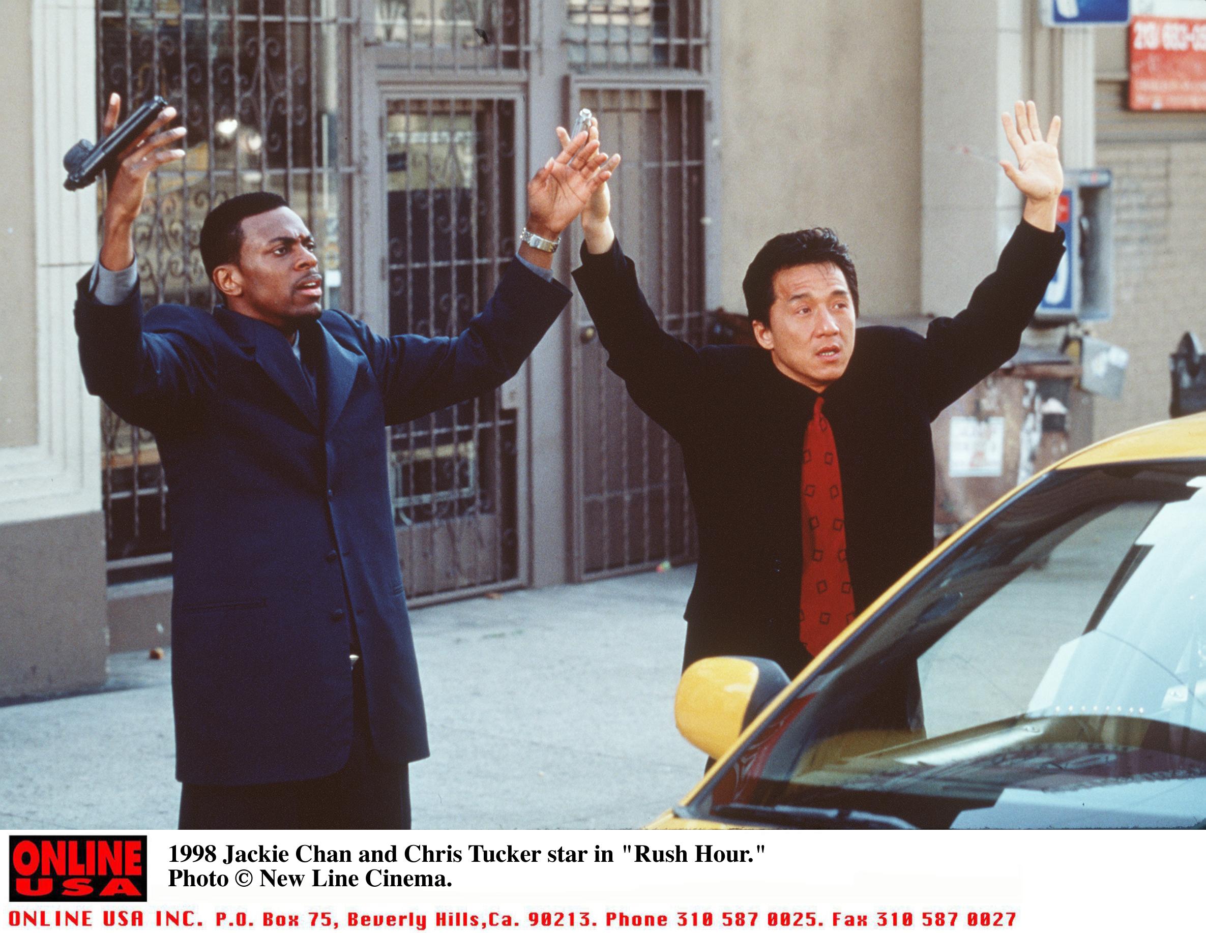 Rush Hour stars Chris Tucker and Jackie Chan both put their hands up