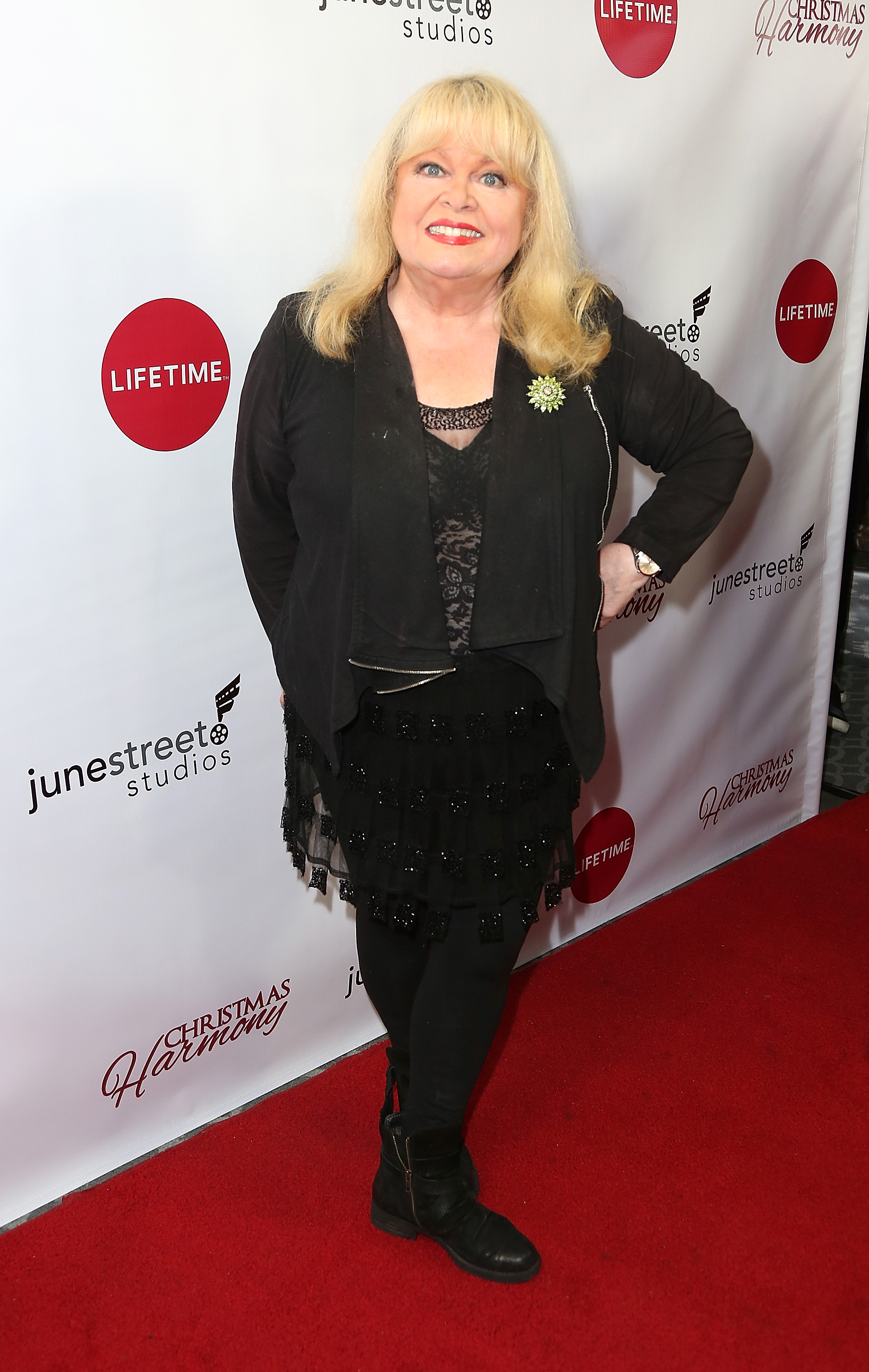Sally Struthers posing with hand on hip at Lifetime's Christmas Harmony premiere