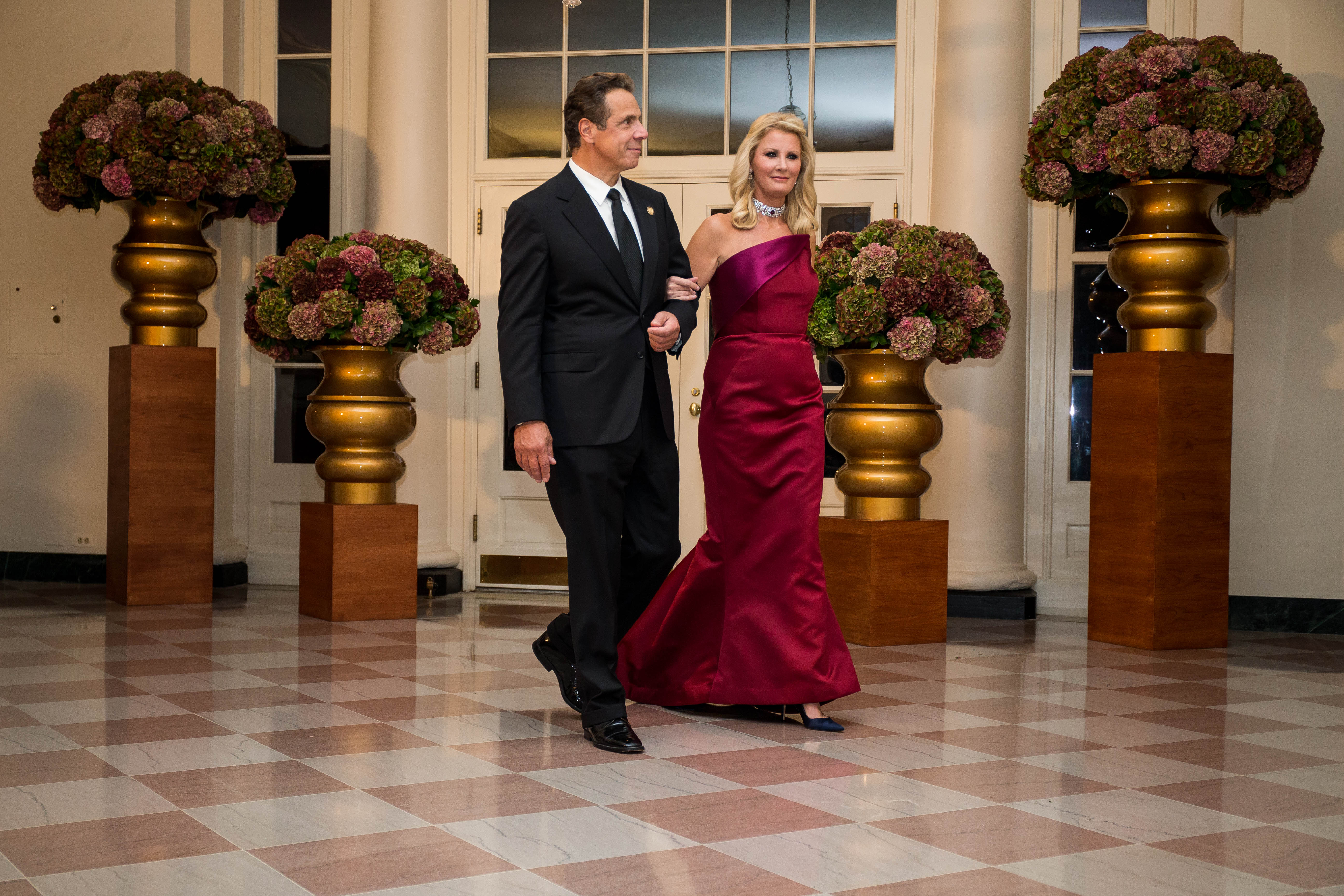 Andrew Cuomo and  Sandra Lee arrive for a State Dinner in honor of Italian Prime Minister Matteo Renzi and his wife Agnese Landini at the White House October 18, 2016 