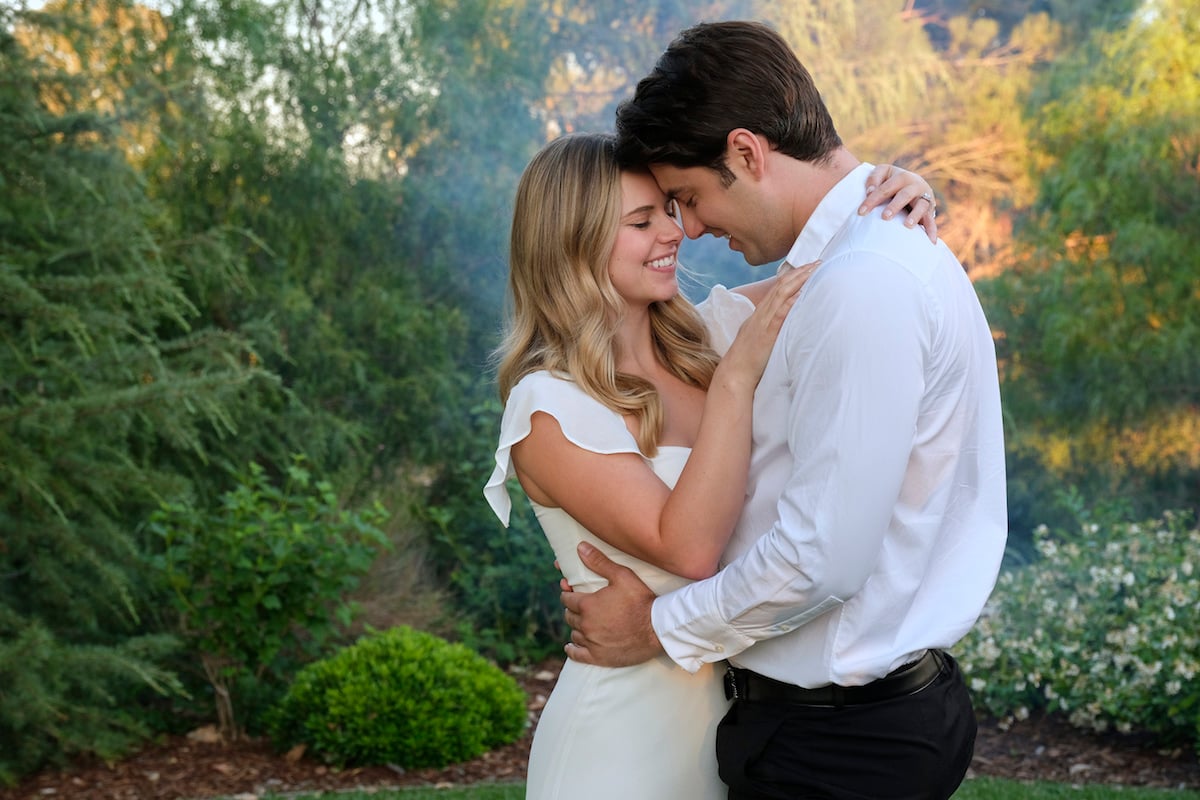 Couple embracing in Save the Wedding