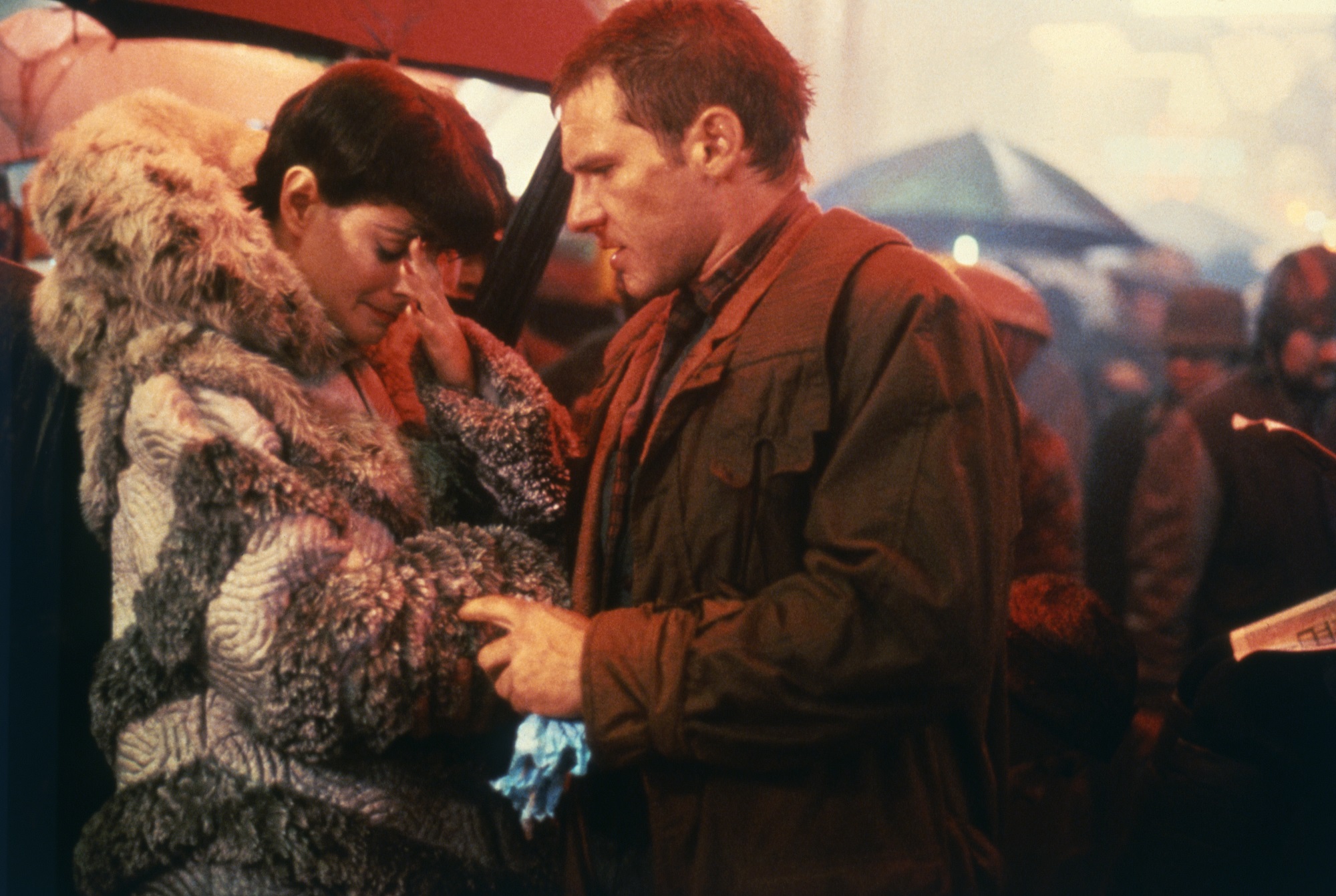 Sean Young and Harrison Ford on the streets of the future in Blade Runner