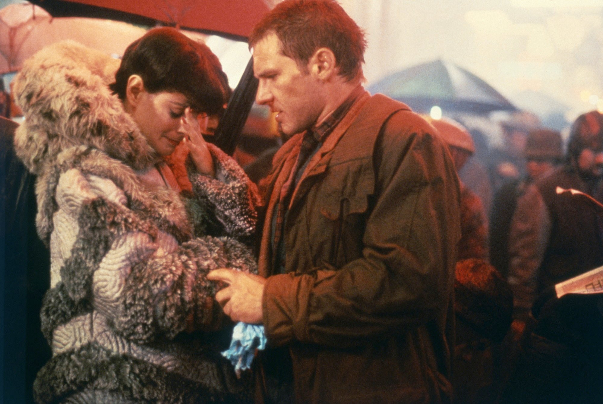 Sean Young and Harrison Ford on the streets of the future in Blade Runner