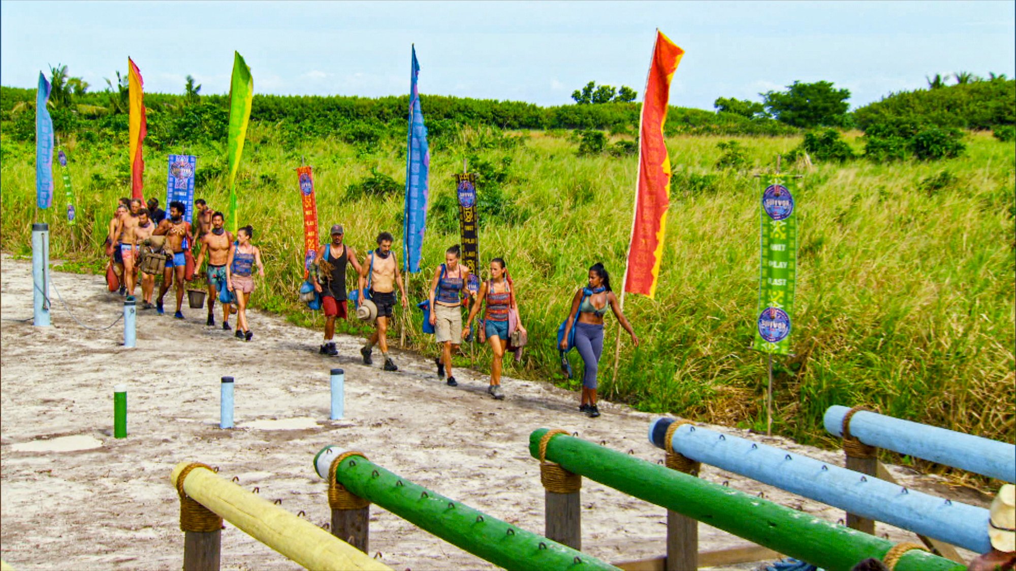 'Survivor' cast members walking into a challenge course
