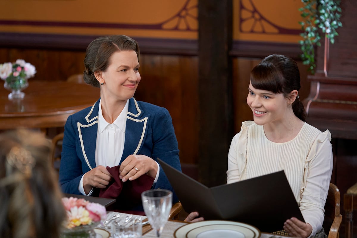 Susannah and Rachel sitting at table in When Calls the Heart