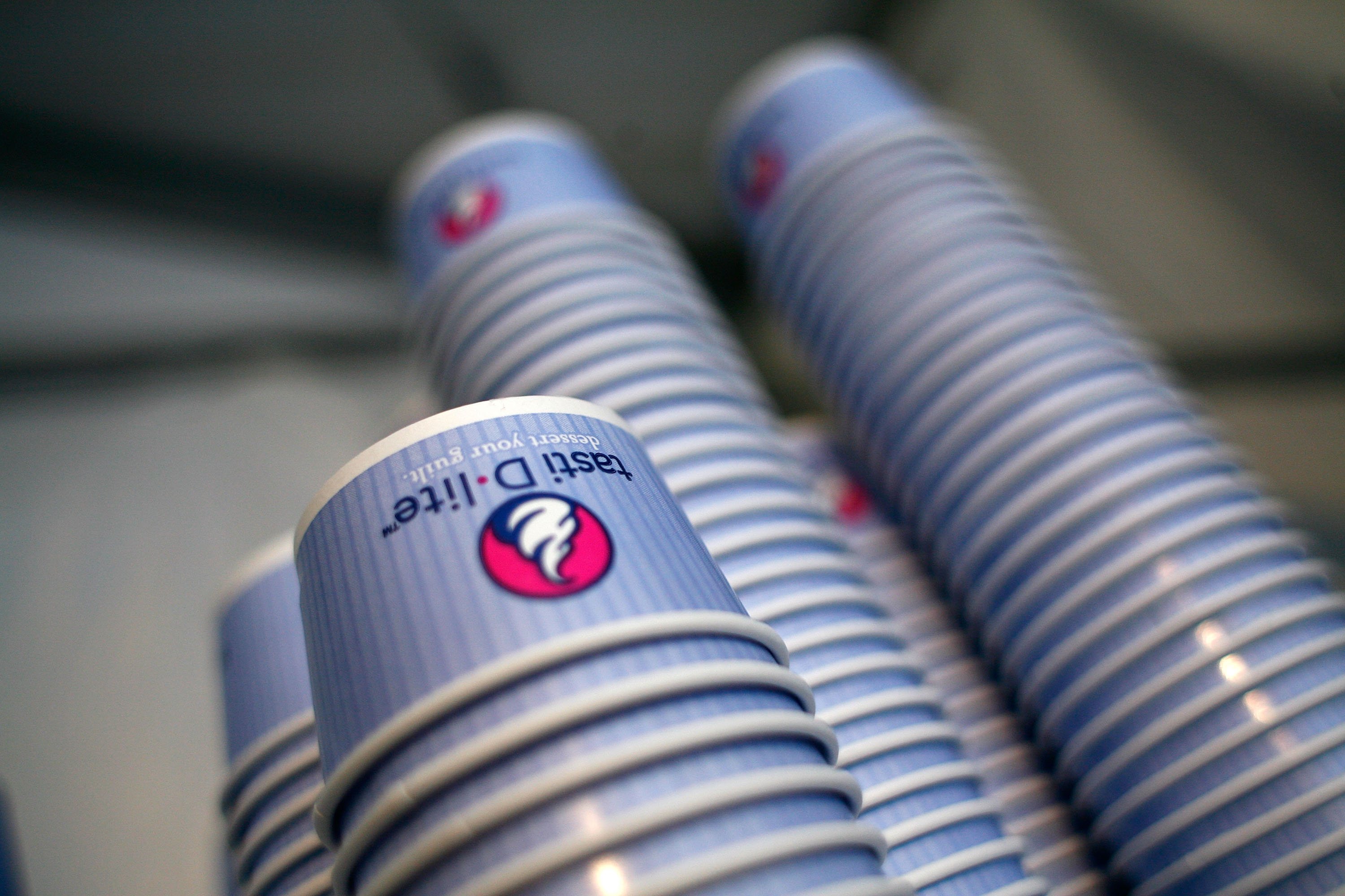 Tasti D-Lite cups are stacked at the tents in Bryant Park during Mercedes-Benz Fashion Week on September 9, 2008