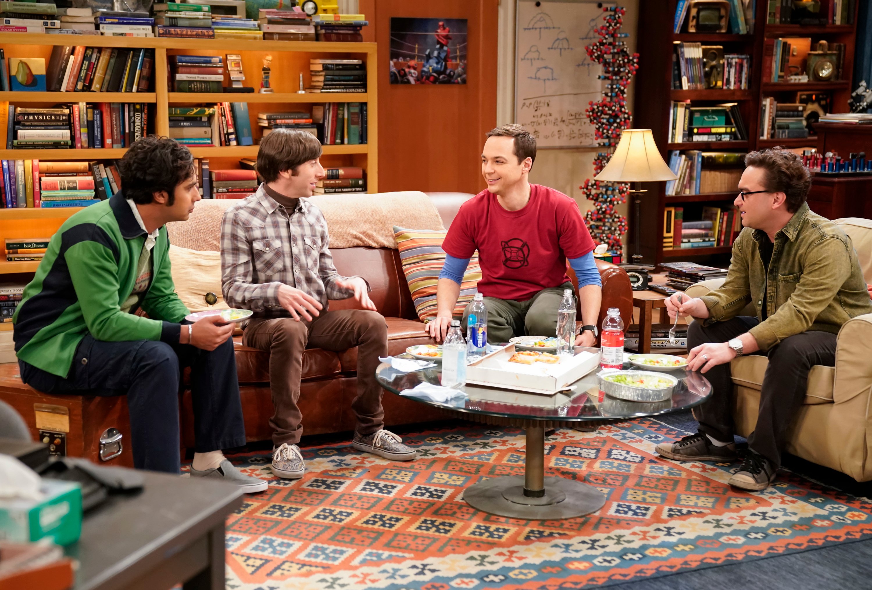 Raj Koothrappali (Kunal Nayyar), Howard Wolowitz (Simon Helberg), Sheldon Cooper (Jim Parsons) and Leonard Hofstadter (Johnny Galecki) sit in the living room in an episode of 'The Big Bang Theory' 