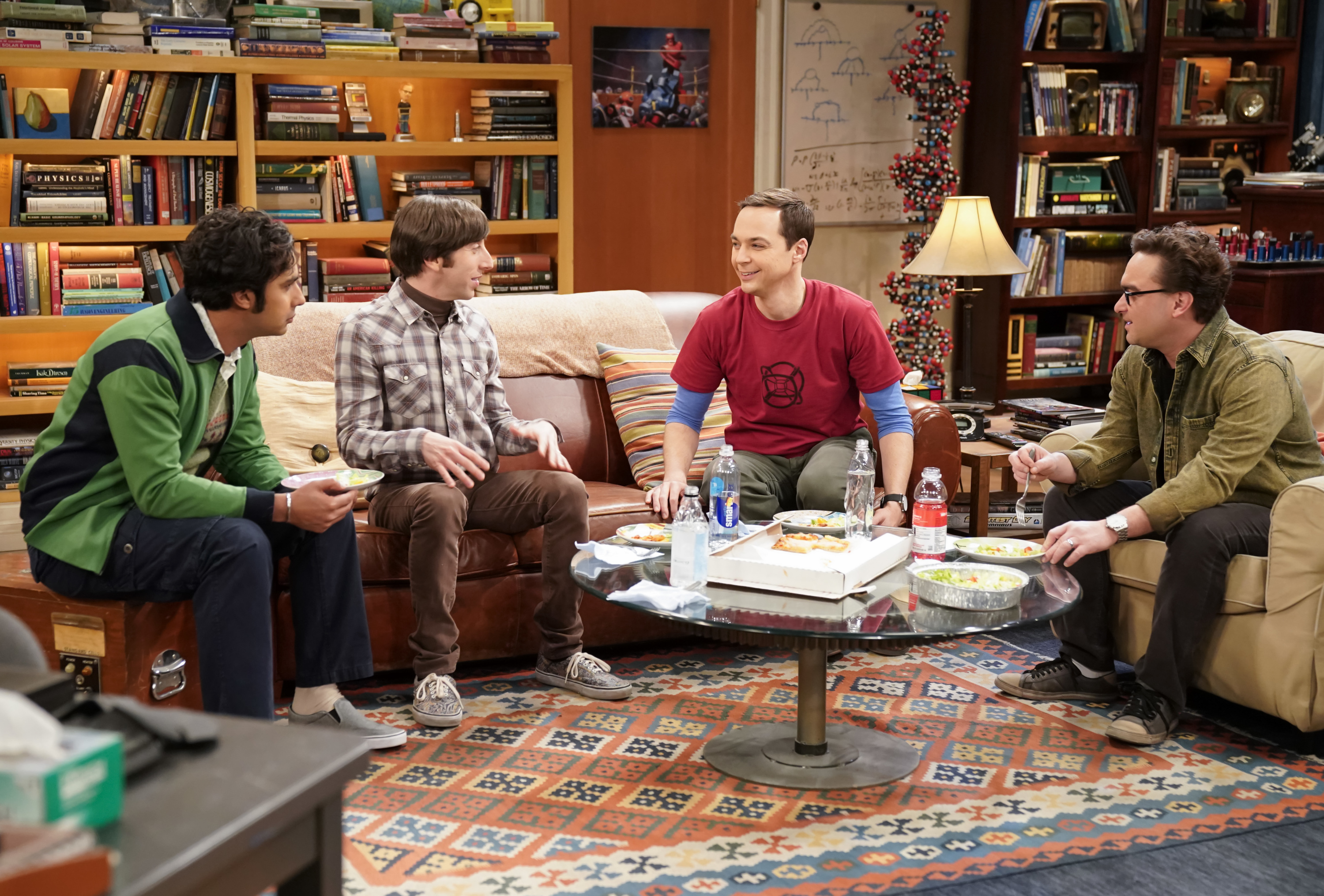 Raj Koothrappali (Kunal Nayyar), Howard Wolowitz (Simon Helberg), Sheldon Cooper (Jim Parsons) and Leonard Hofstadter (Johnny Galecki) sit in the living room in an episode of 'The Big Bang Theory'
