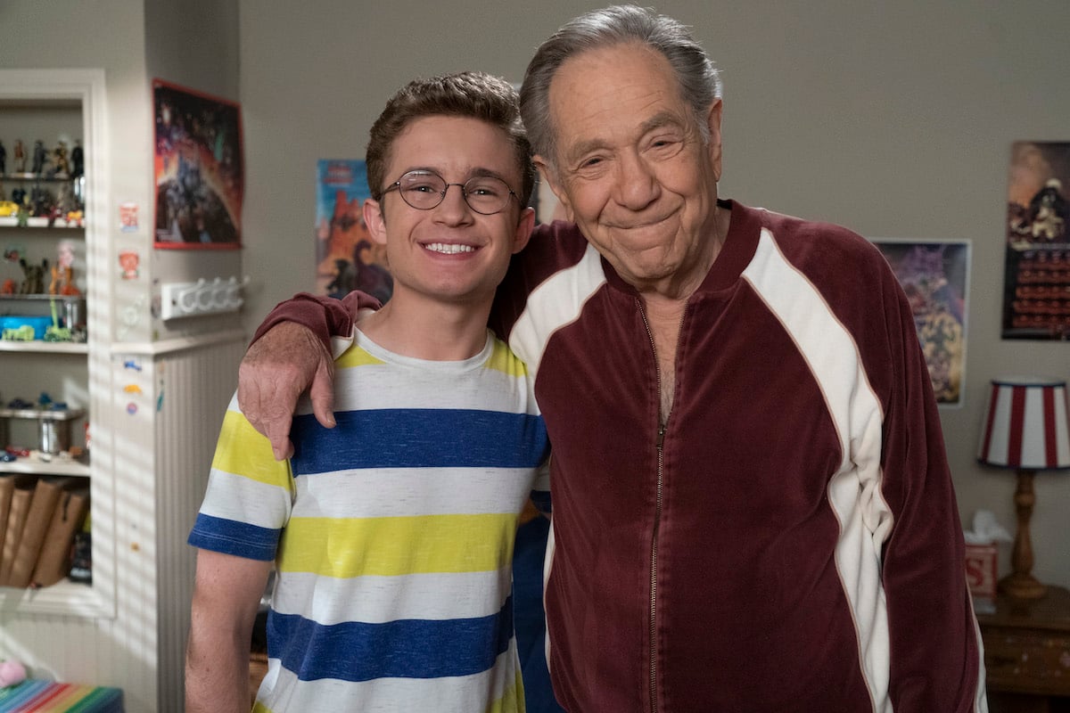 Sean Giambrone and George Segal on the set of The Goldbergs