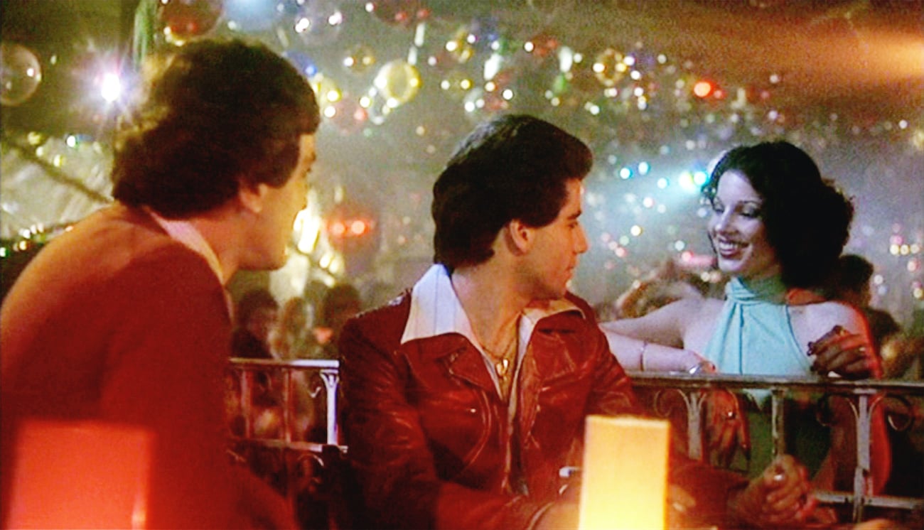 'Saturday Night Fever' scene with  Martin Shakar as Frank Manero Jr.,  John Travolta as Tony Manero and Fran Drescher as Connie |  CBS via Getty Images