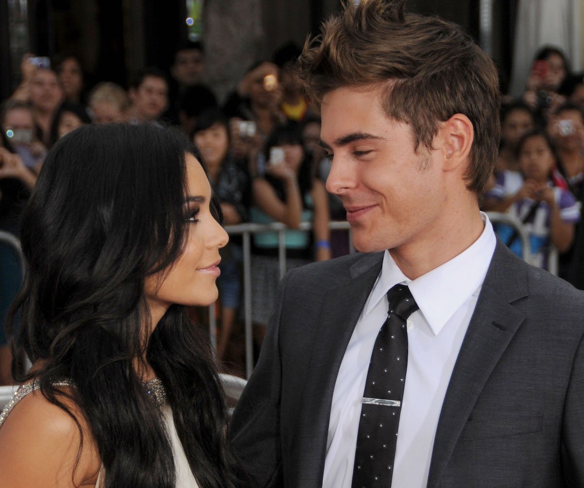 Vanessa Hudgens and Zac Efron from 'High School Musical' look at each other lovingly on a red carpet in 2010