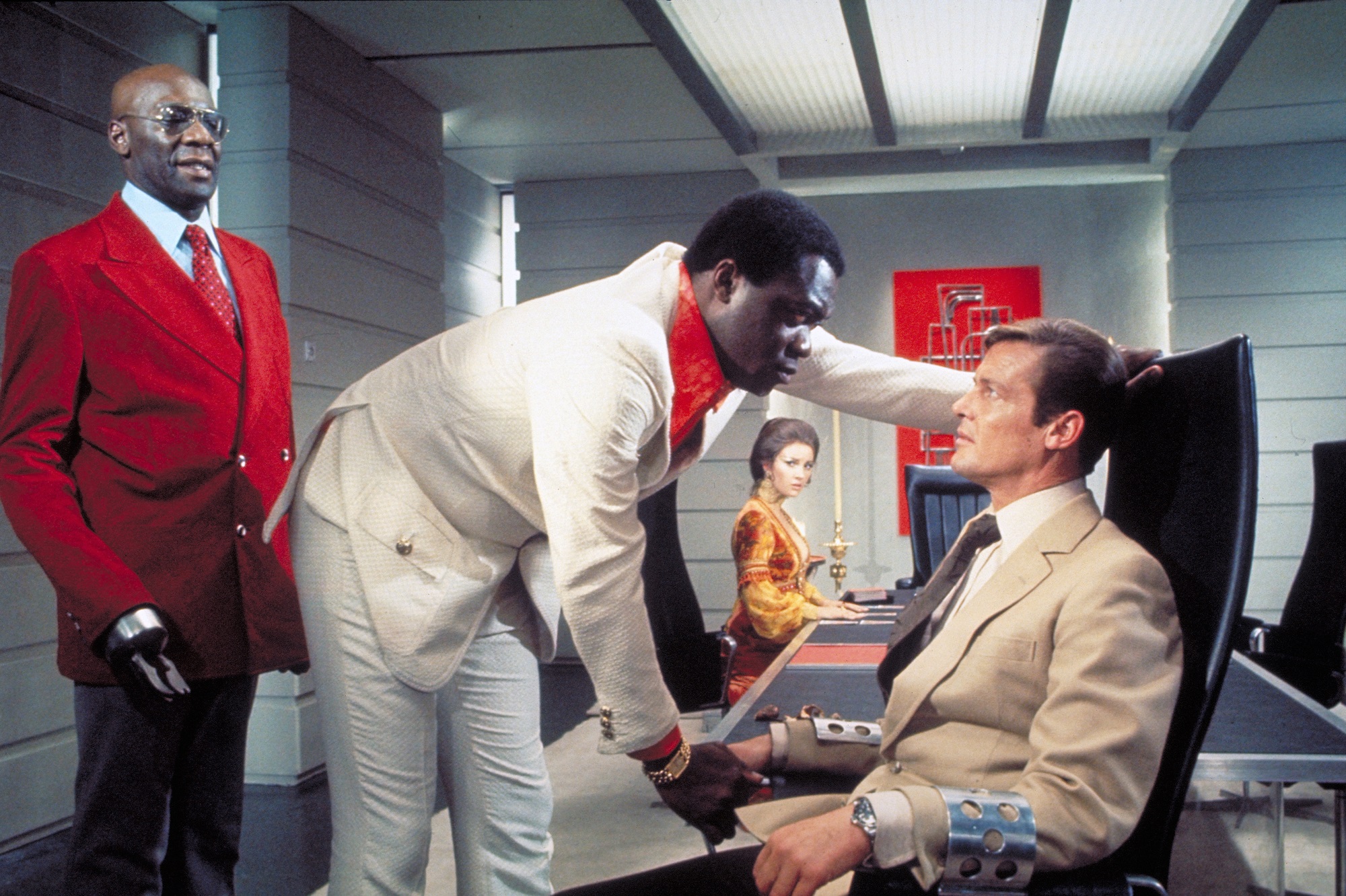 Yaphet Kotto interrogates Roger Moore