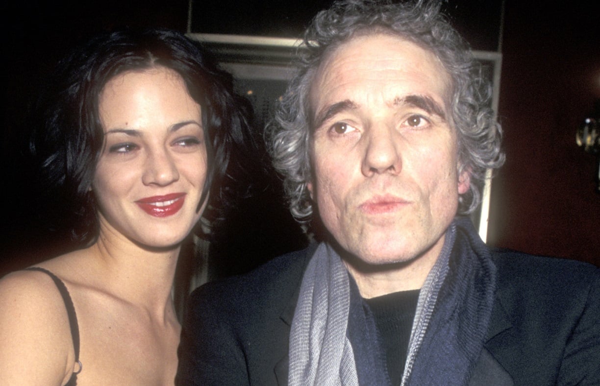 Abel Ferrara attending a 1999 screening with a date to his right