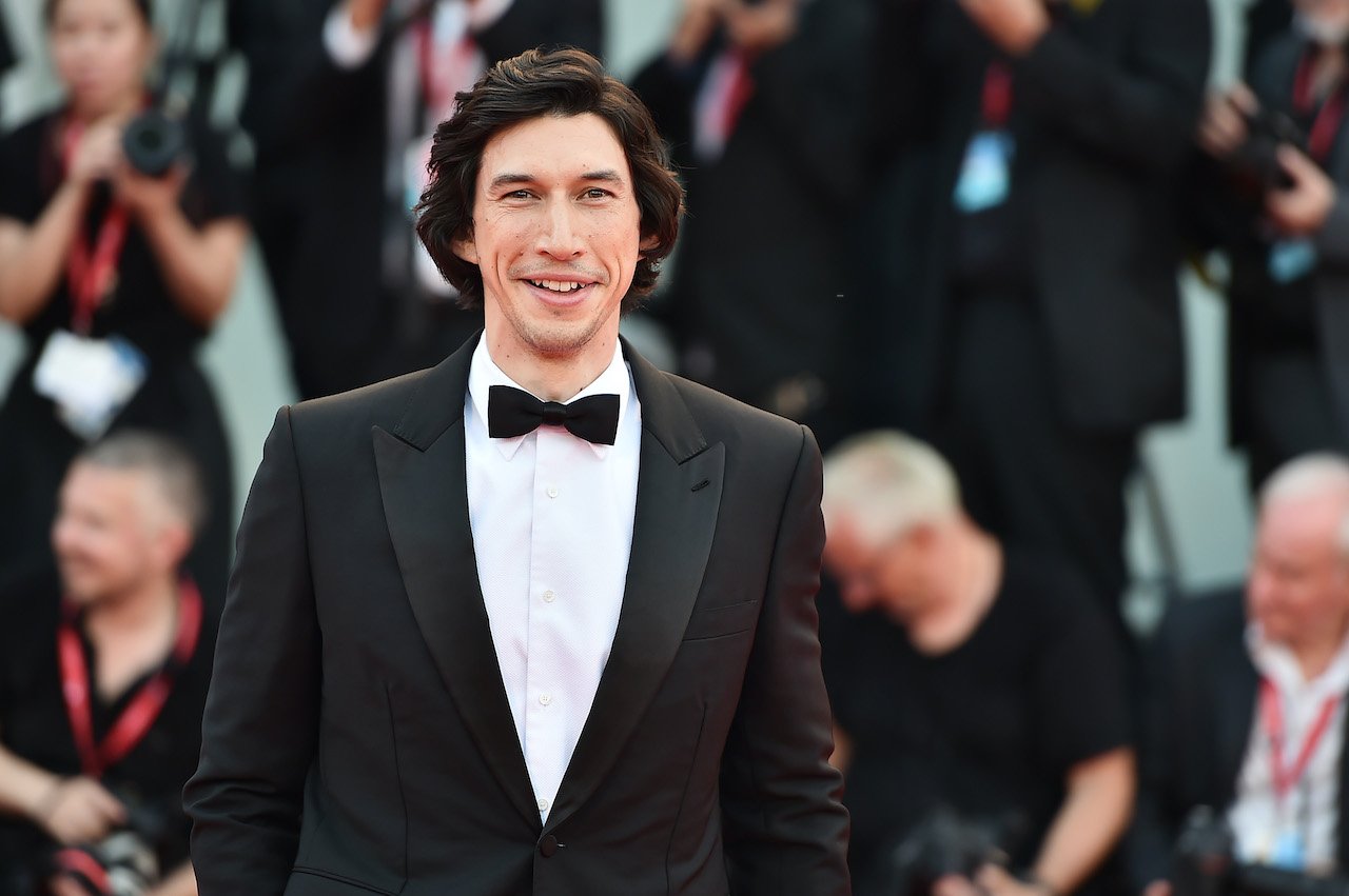 Adam Driver walks the red carpet ahead of the "Marriage Story" screening during during the 76th Venice Film Festival 