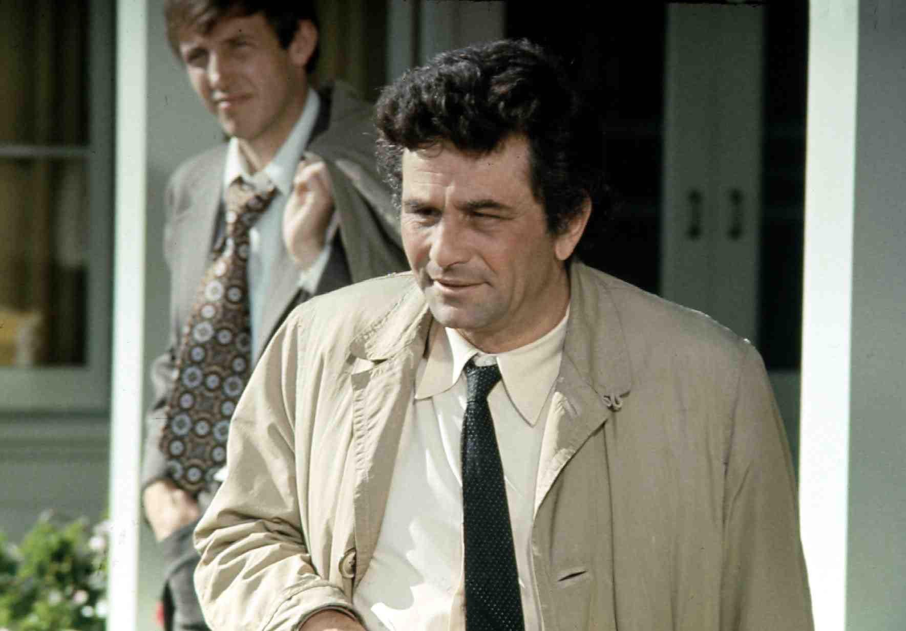 Peter Falk in front of a man