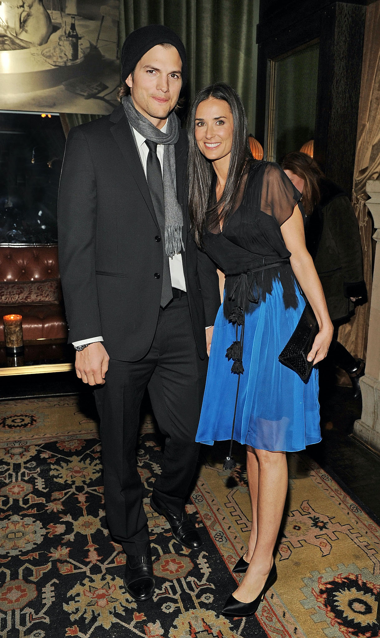 Ashton Kutcher (L) and Demi Moore attend the after party for the Cinema Society with DKNY Jeans & DeLeon Tequila screening of 'No Strings Attached' at the Soho Grand Hotel in 2011