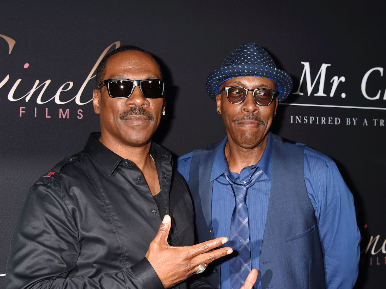 Actors Eddie Murphy (L) and Arsenio Hall arrive at the premiere of Cinelou Releasing's 'Mr. Church'