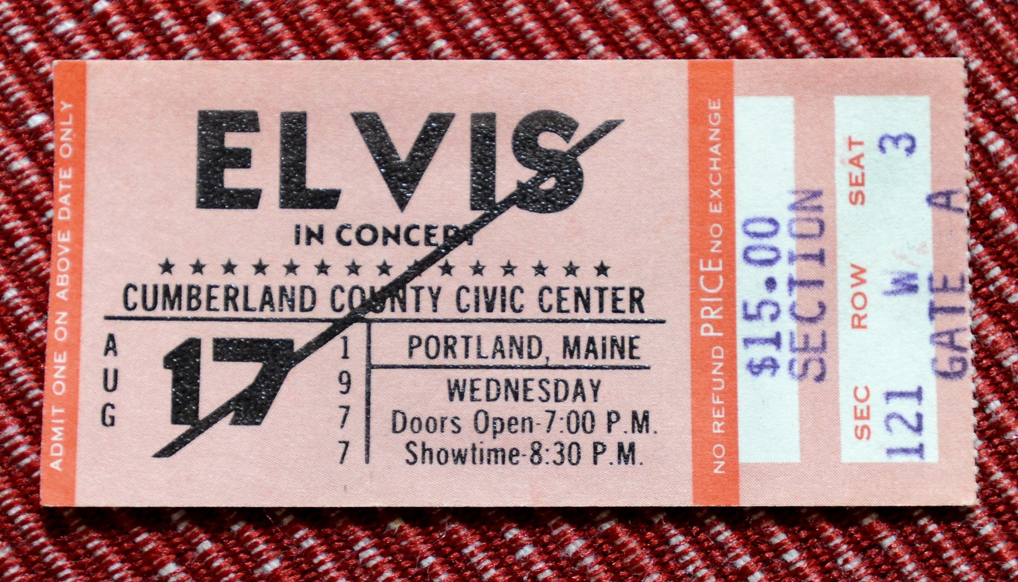 A ticket to an Elvis Presley concert with a pen mark on it