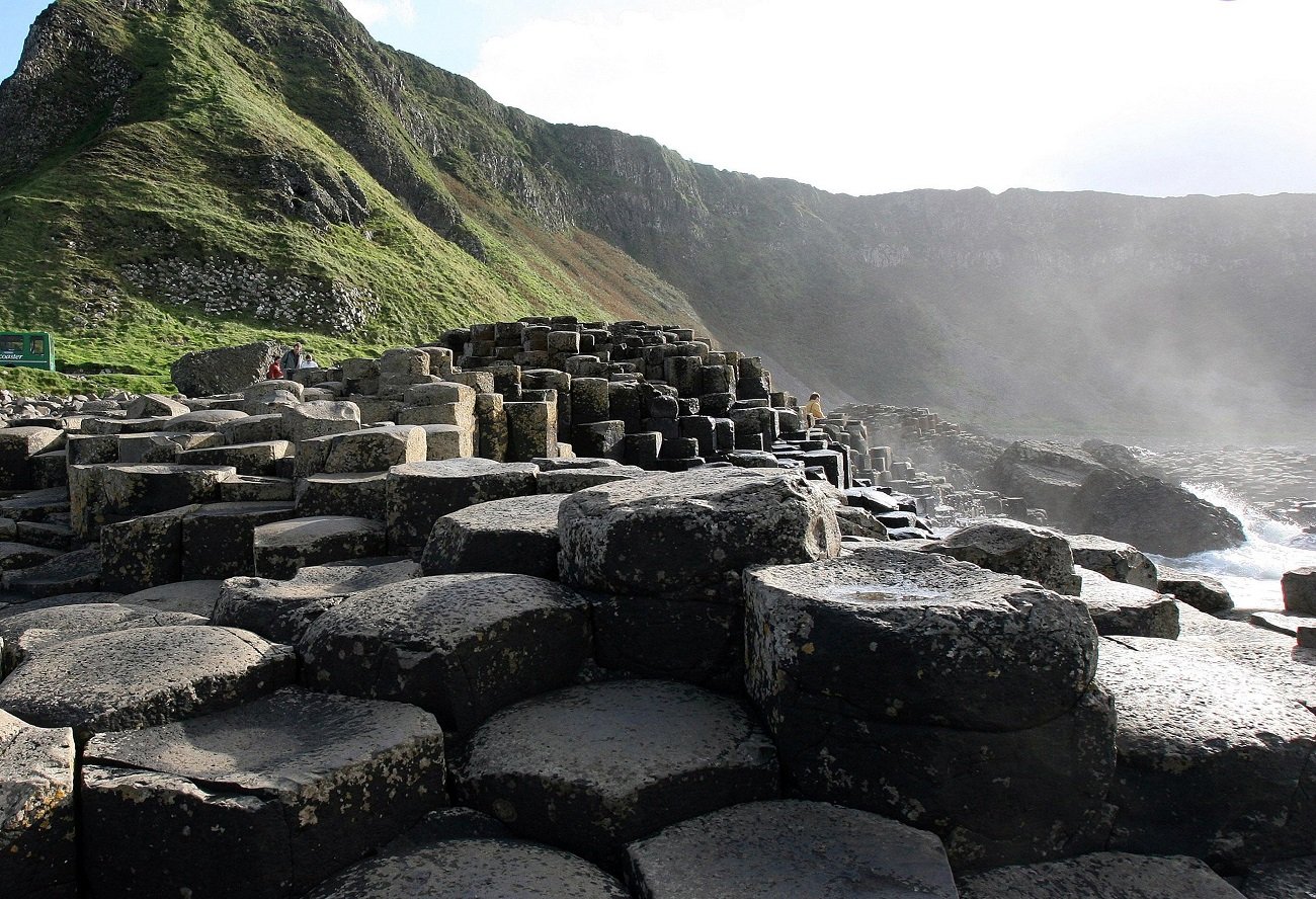 View of rocks and moss-covered mountain landscape of Giant's Causeway in Ireland