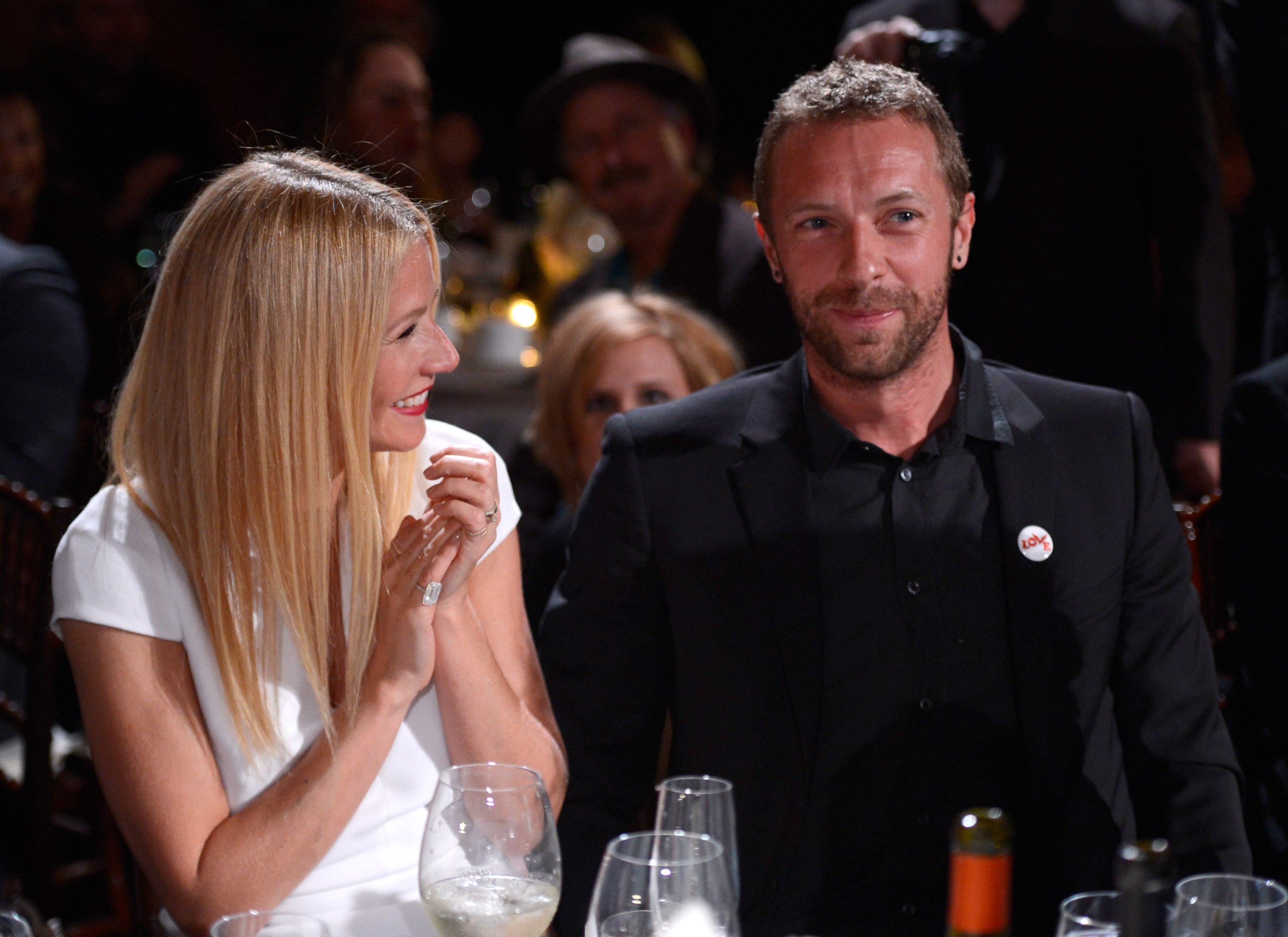 Chris Martin and Gwyneth Paltrow near people