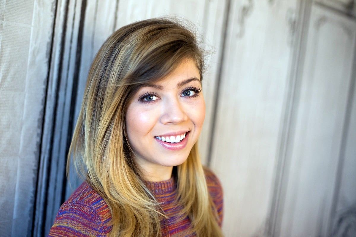 Jennette McCurdy smiling at AOL BUILD Speaker Series to discuss her series 'Between' in 2015