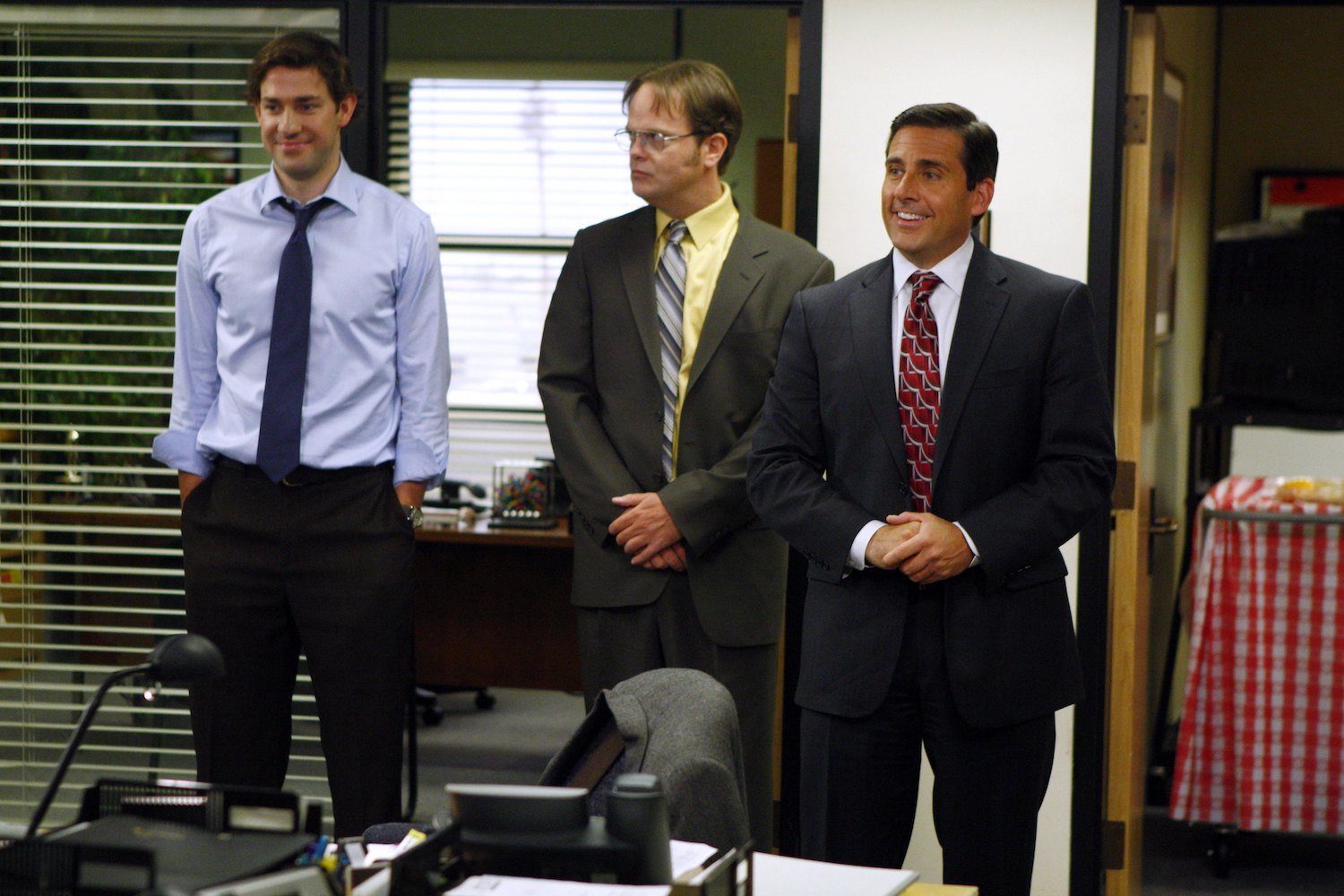 The Office cast John Krasinski, Rainn Wilson, and Steve Carell as their characters Jim, Dwight, and Michael