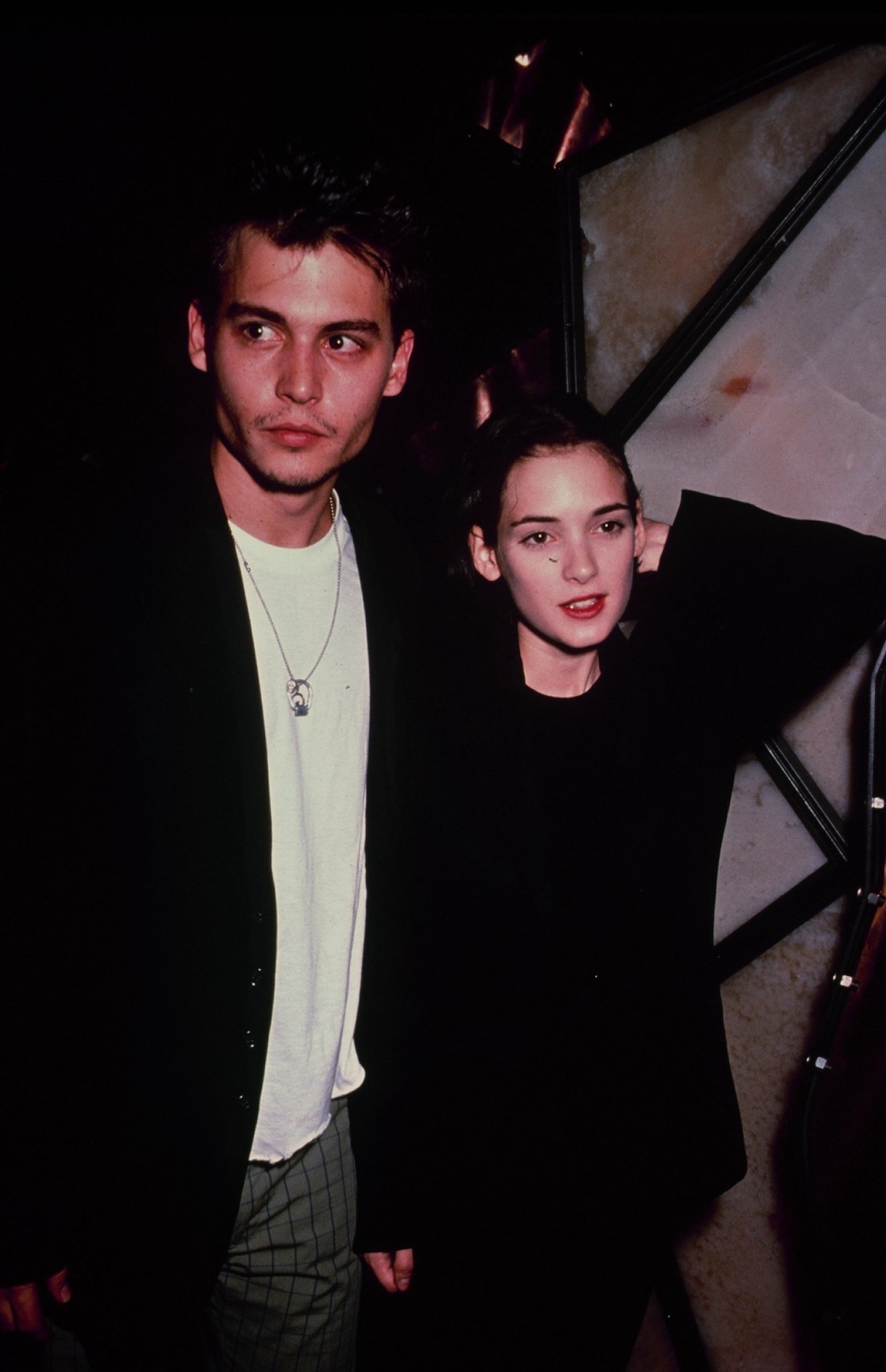 American actress Winona Ryder with her boyfriend, actor Johnny Depp, circa 1990