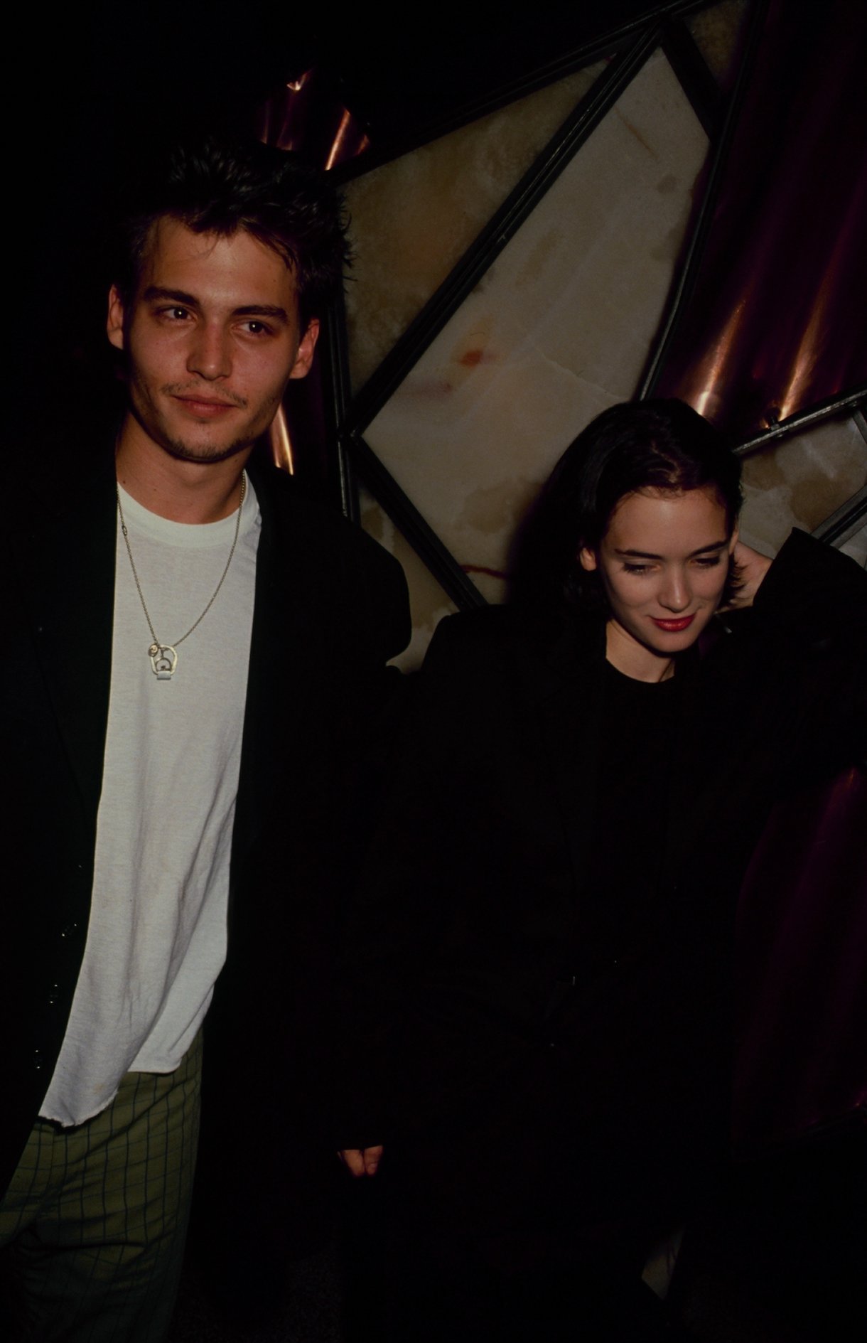 American actress Winona Ryder with her boyfriend, actor Johnny Depp, circa 1990