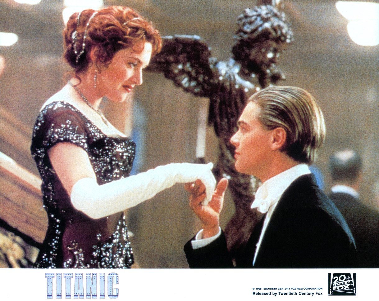 Kate Winslet offers her hand to Leonardo DiCaprio in a scene from the film 'Titanic'