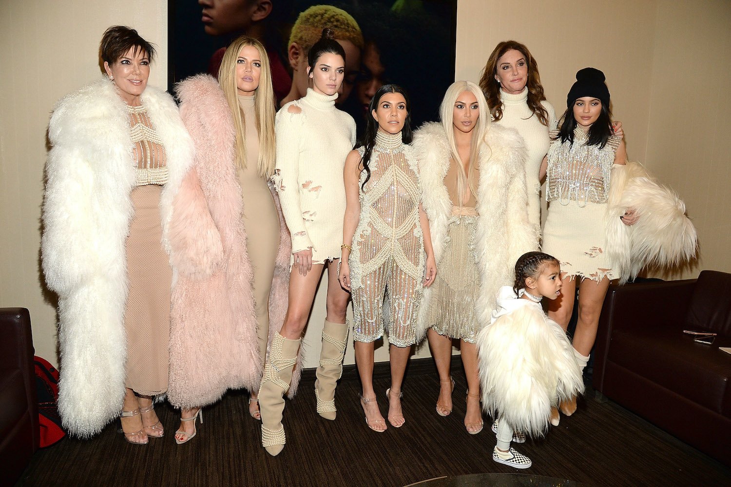 Kris Jenner, Khloe Kardashian, Kendall Jenner, Kourtney Kardashian, Kim Kardashian West, North West, Caitlyn Jenner, and Kylie Jenner attend Kanye West Yeezy Season 3 at Madison Square Garden