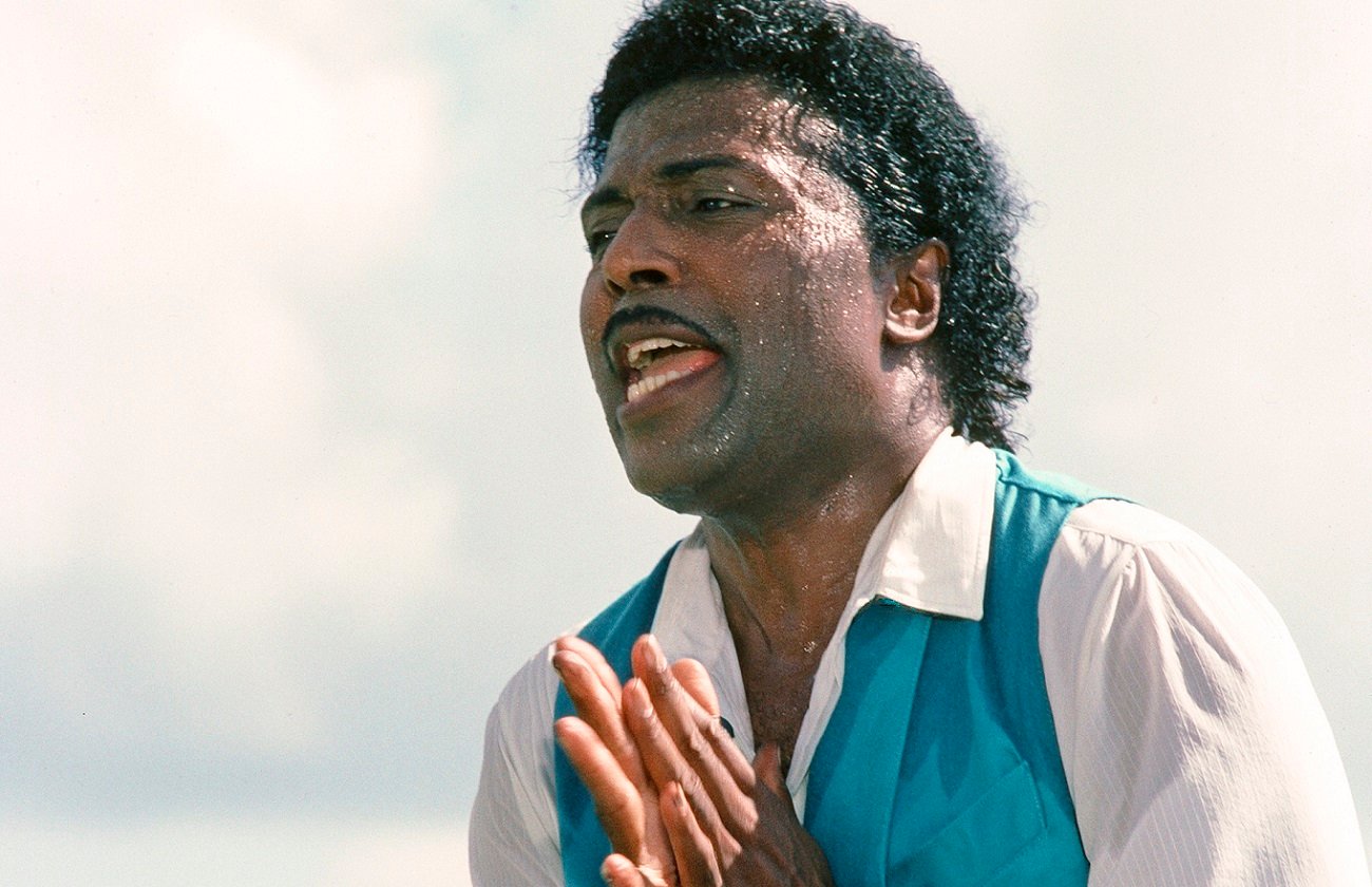 Little Richard stands in the sun and is covered in sweat in an appearance on 'Miami Vice'
