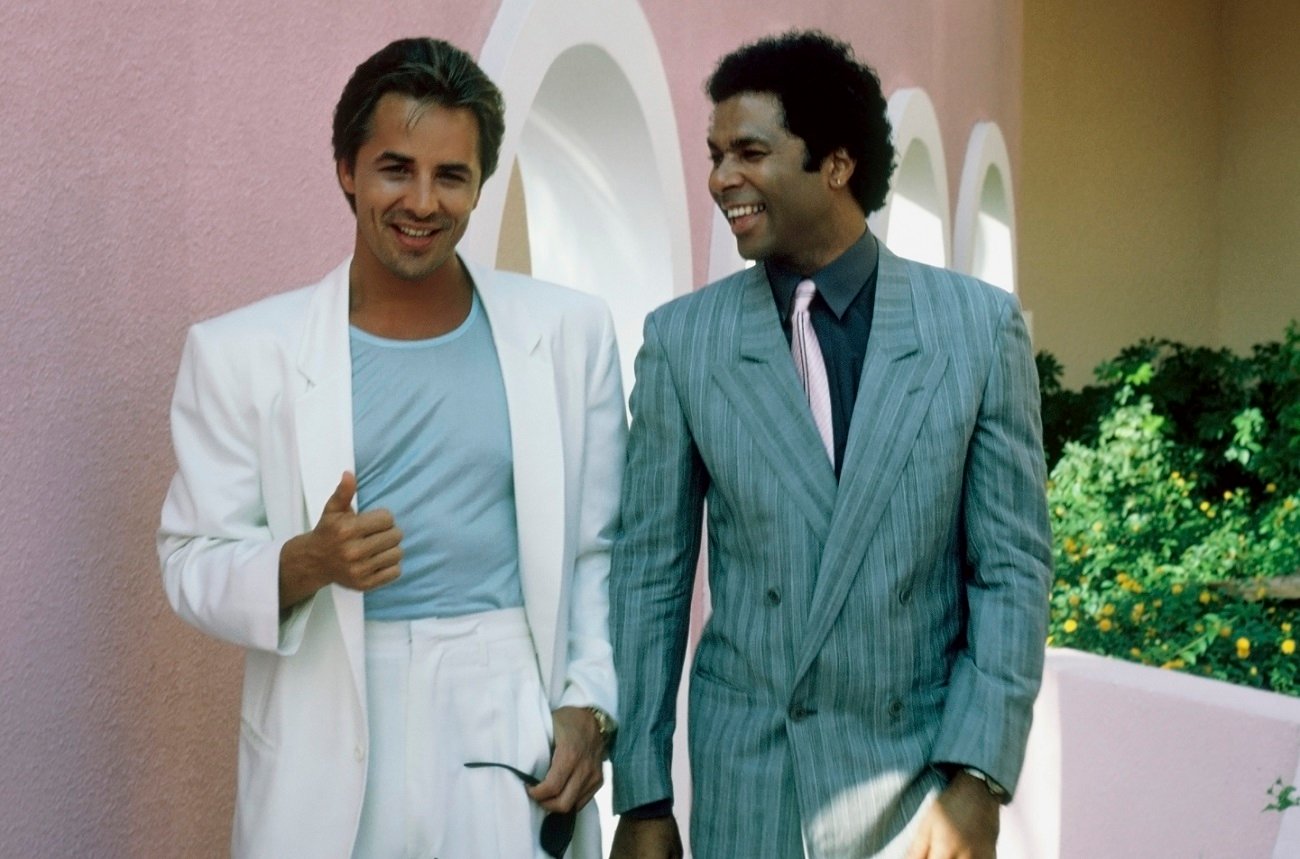 Don Johnson and Philip Michael Thomas laugh on the 'Miami Vice' set circa 1985