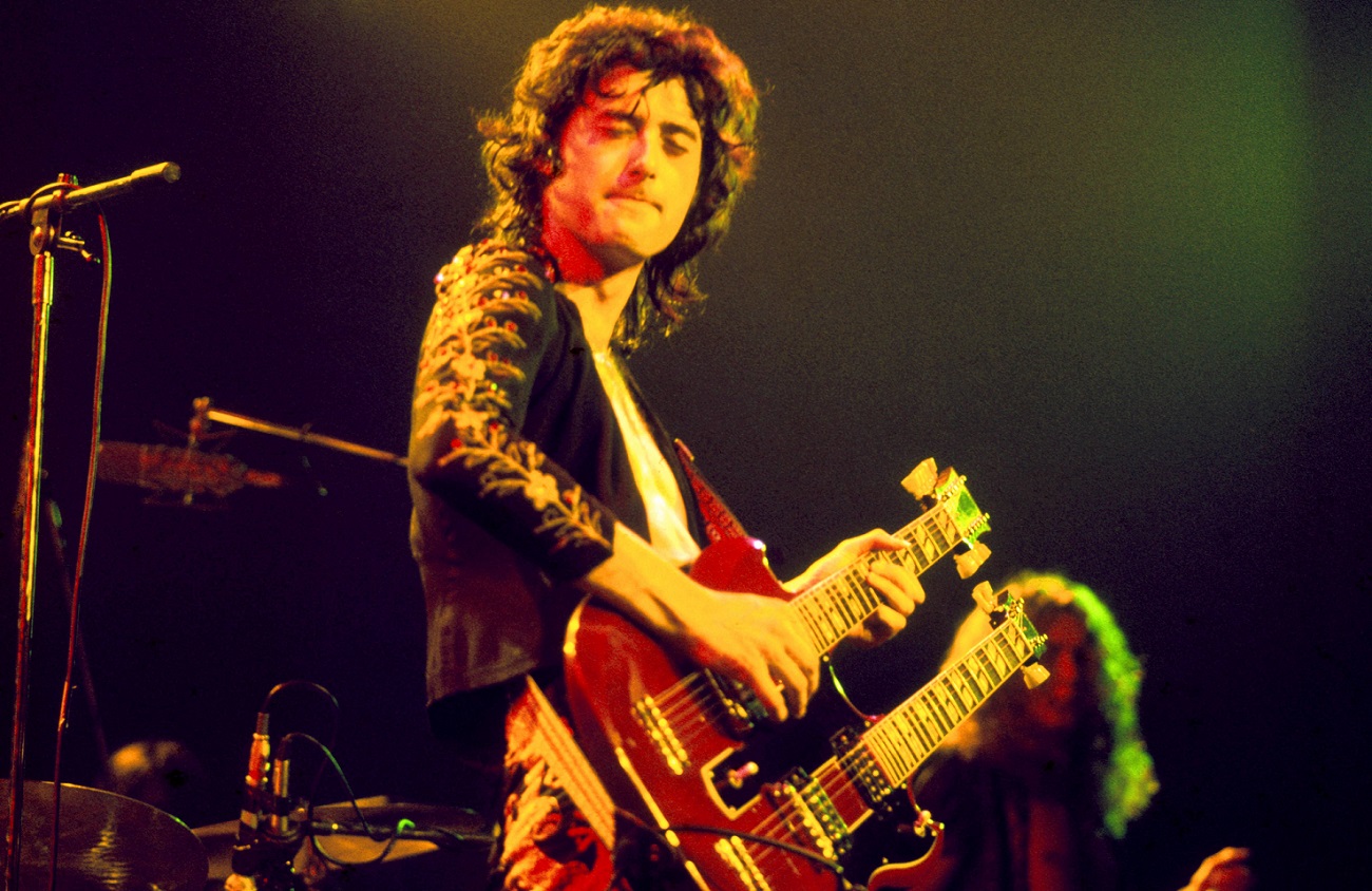 Jimmy Page, playing a Gibson EDS-1275 double-neck guitar, performs live on stage in July 1973