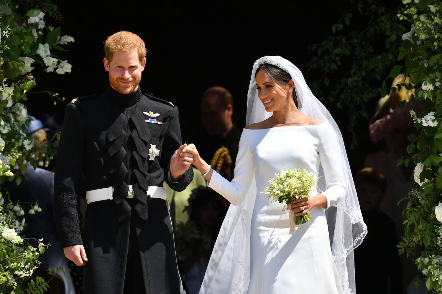 Prince Harry and Meghan Markle come out the West Door of St George's Chapel, Windsor Castle after their wedding ceremony