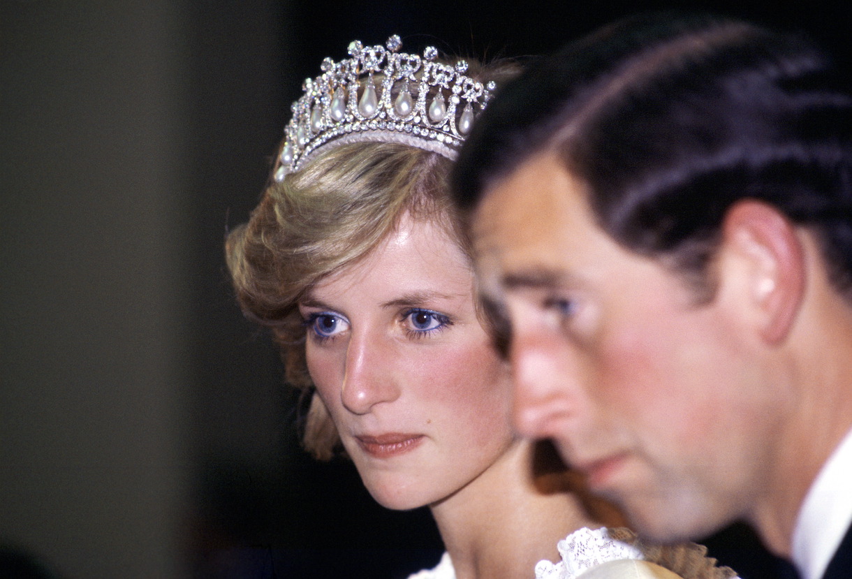 The Prince And Princess Of Wales Looking Unhappy During A Banquet In New Zealand
