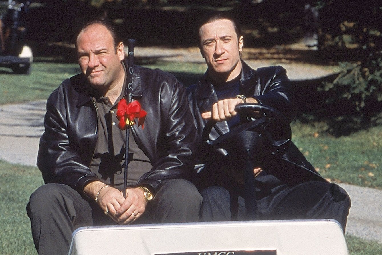 James Gandolfini as Tony Soprano and Federico Castelluccio as Furio Giunta sit in a golf cart in a scene from "The Sopranos"