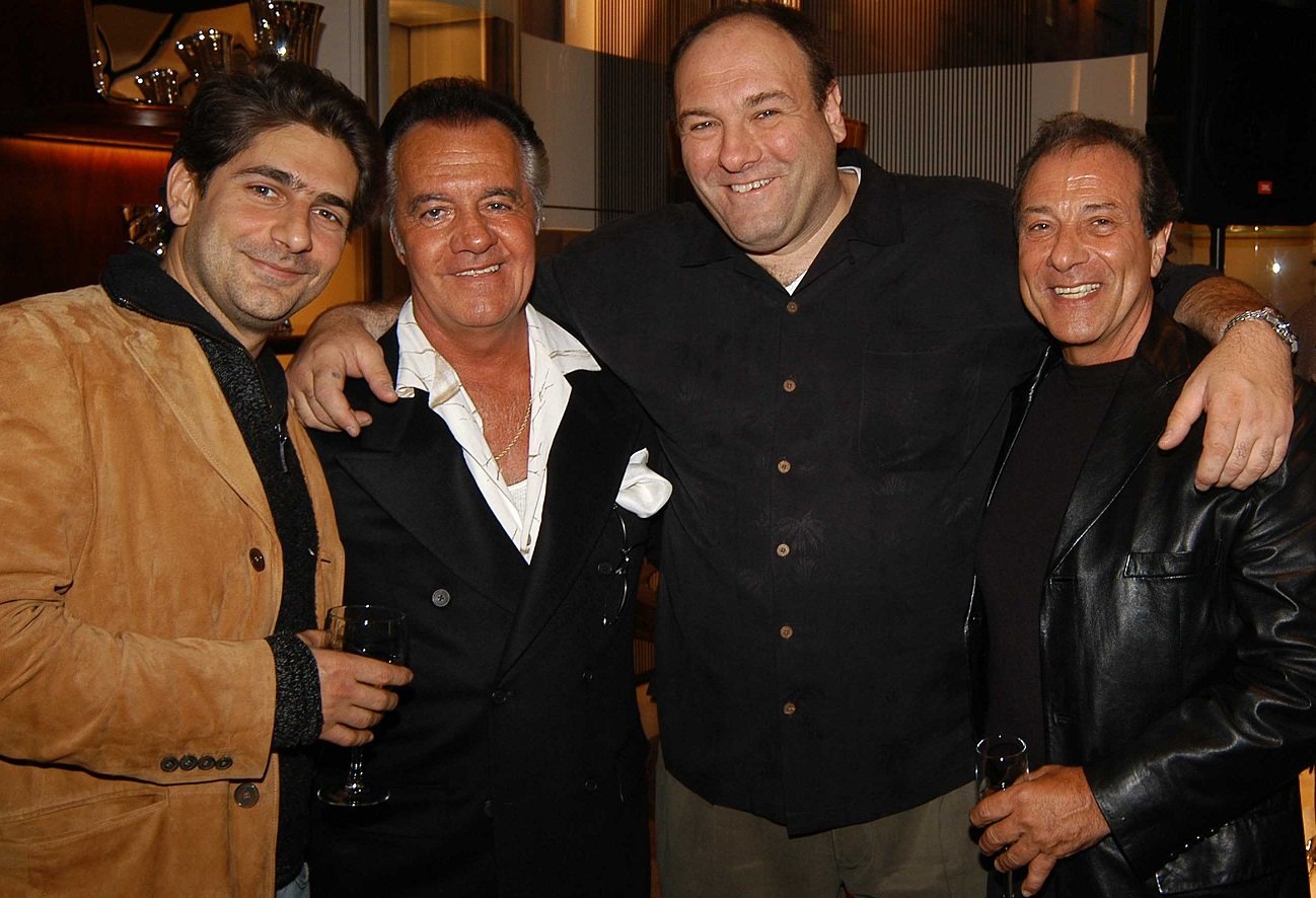 Dan Grimaldi smiling for the camera with other 'Sopranos' stars