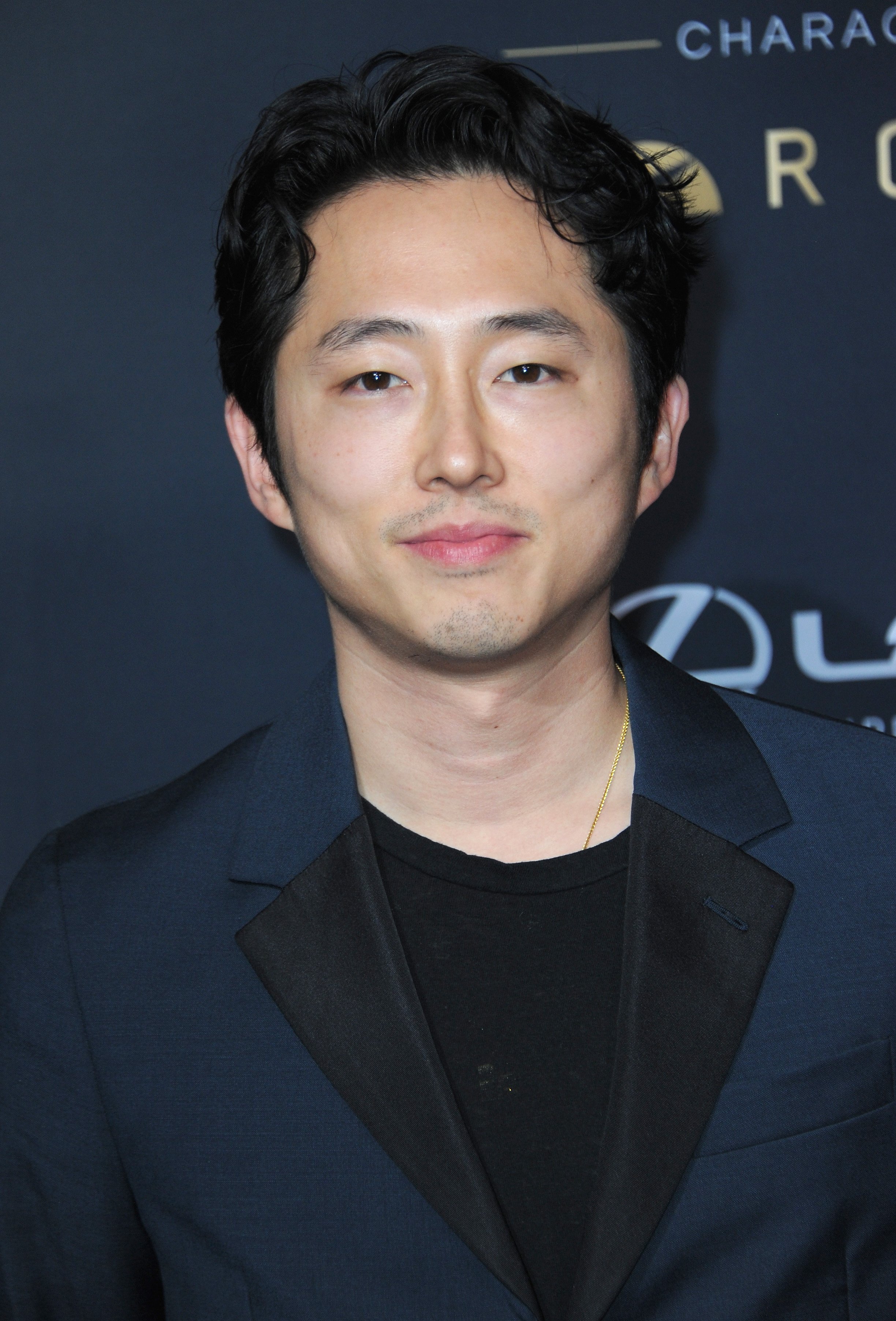 Steven Yeun on the red carpet