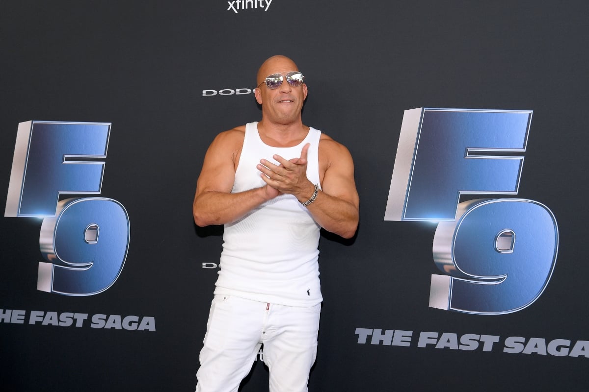 Vin Diesel claps as he poses for cameras at 'Fast and Furious 9' event in January 2020